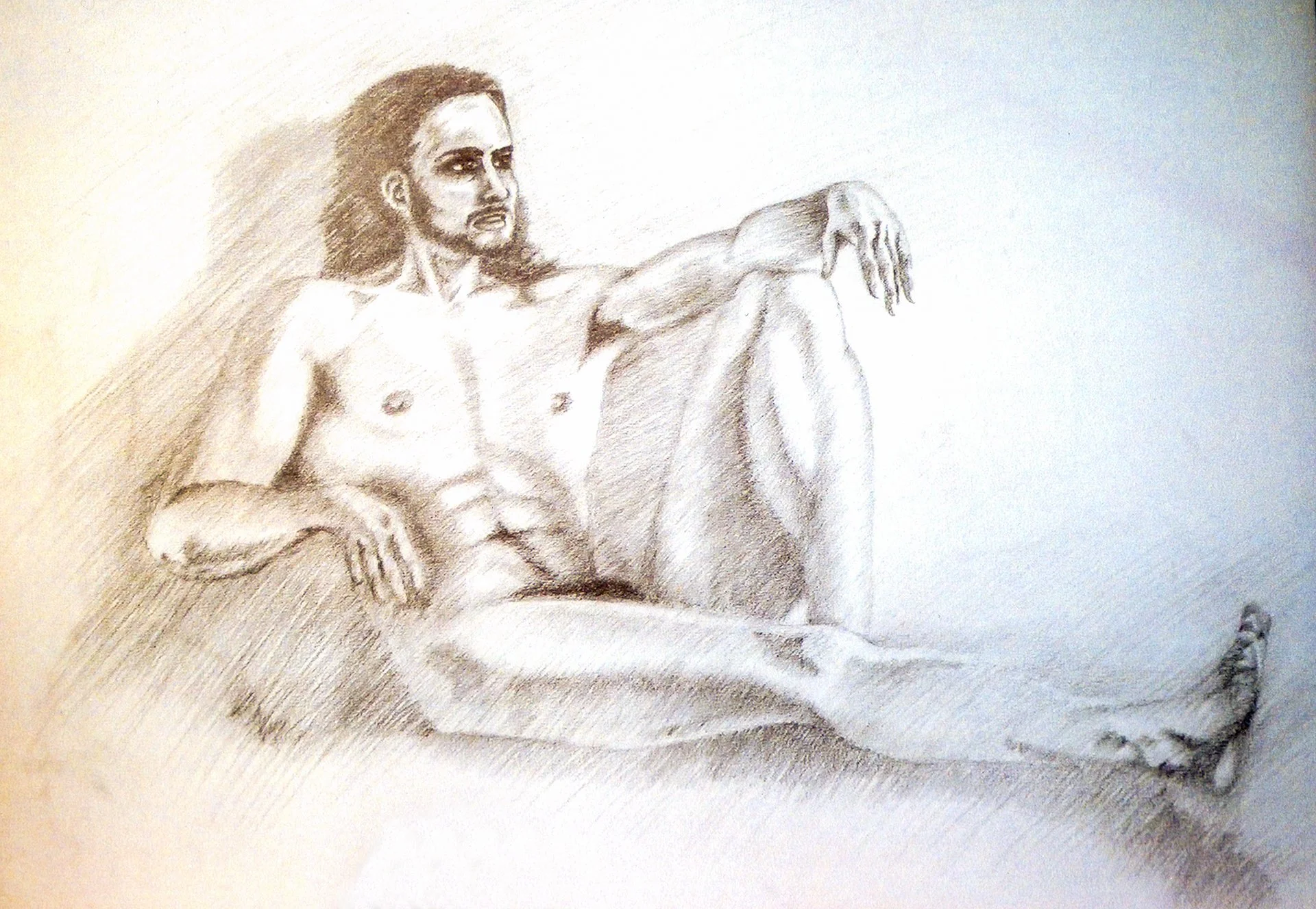 A self portrait drawing by Rob Covington using graphite and a mirror.