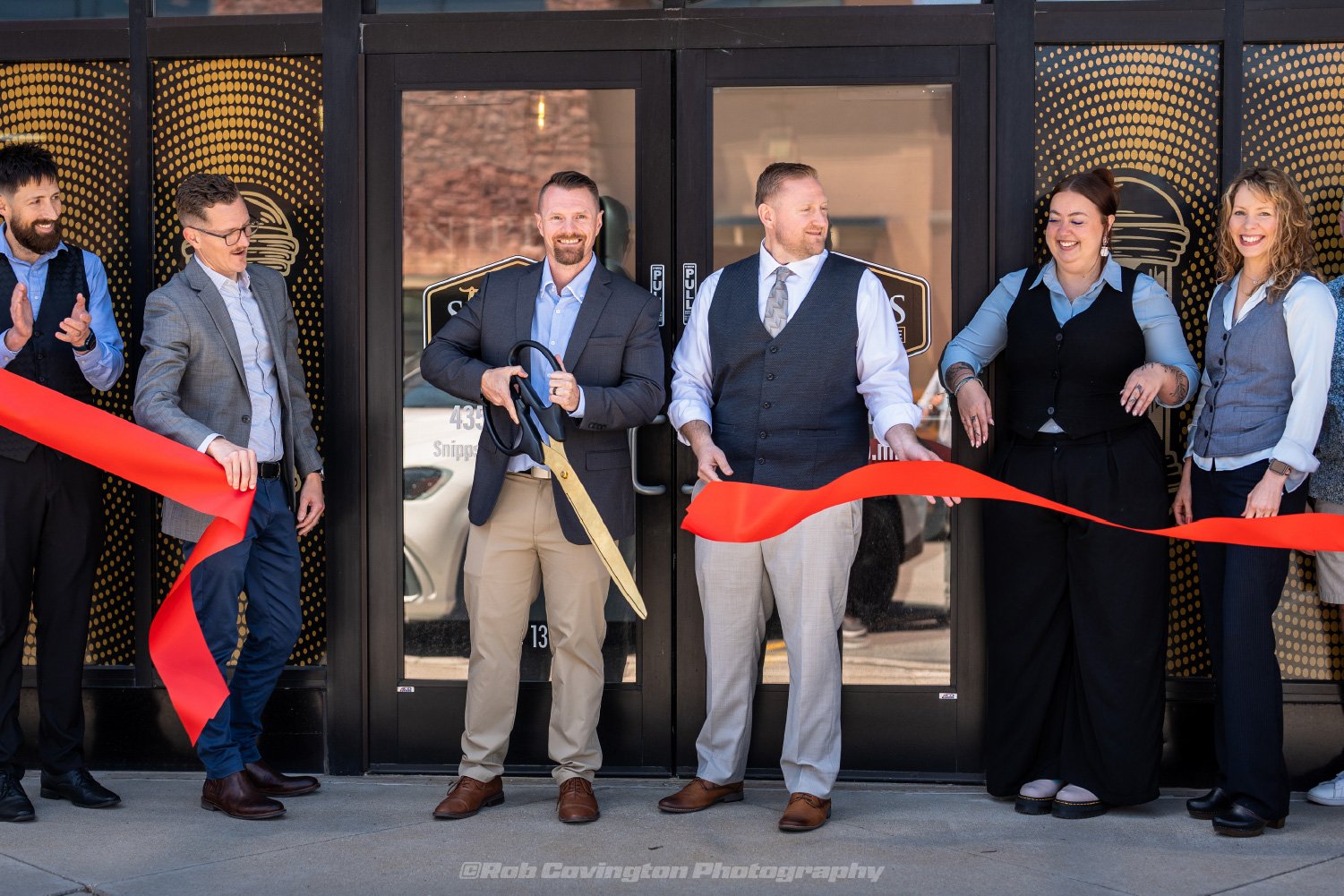 Snipps ribbon cutting event photography by Rob Covington