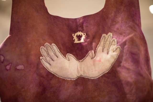 Ceremonial garment for a non-birthing parent, Detail 2024 Fabric, ceramic