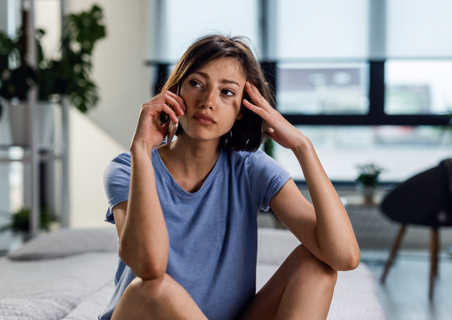 girl looking like she feels bad