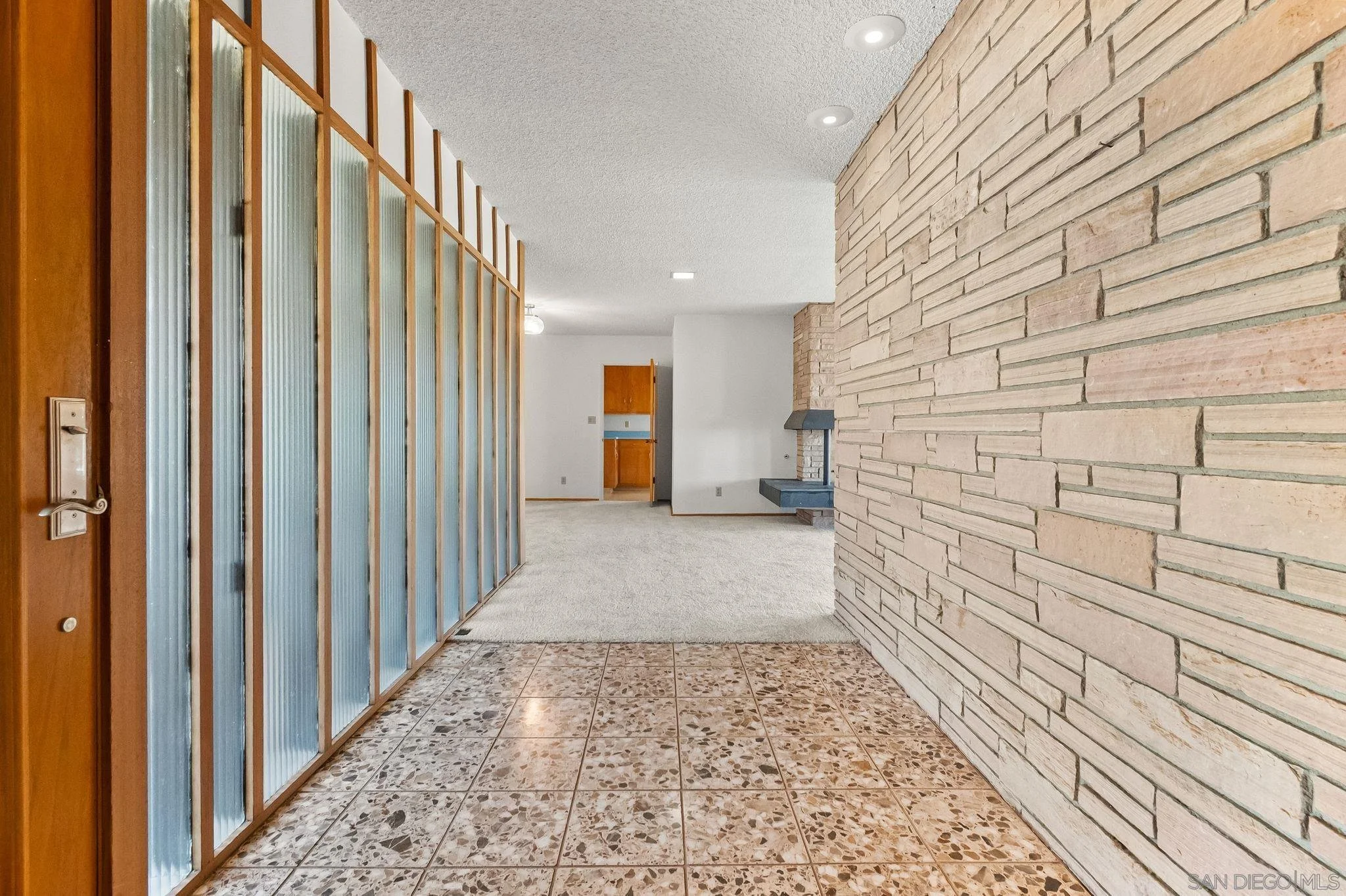 Mid Century modern home in Del Cerro featuring wonderful original details, timeless character, and an unbeatable location.