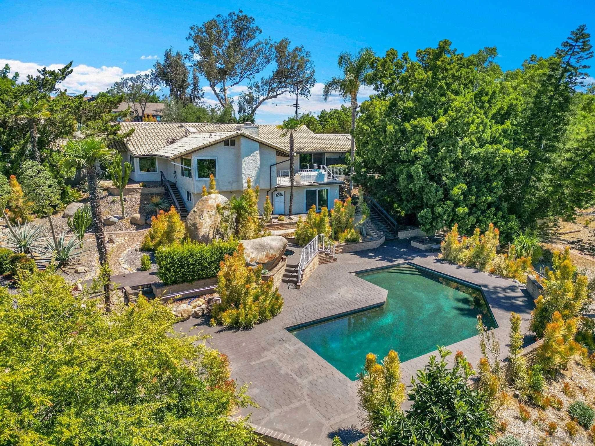 Modern in El Cajon with a pool, views, updated kitchen/baths and an ADU.  