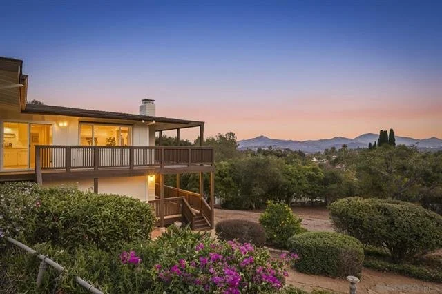 Escondido Mid Century Modern home from the early 70s showcasing updated finishes, great views, and a wide and usable lot.