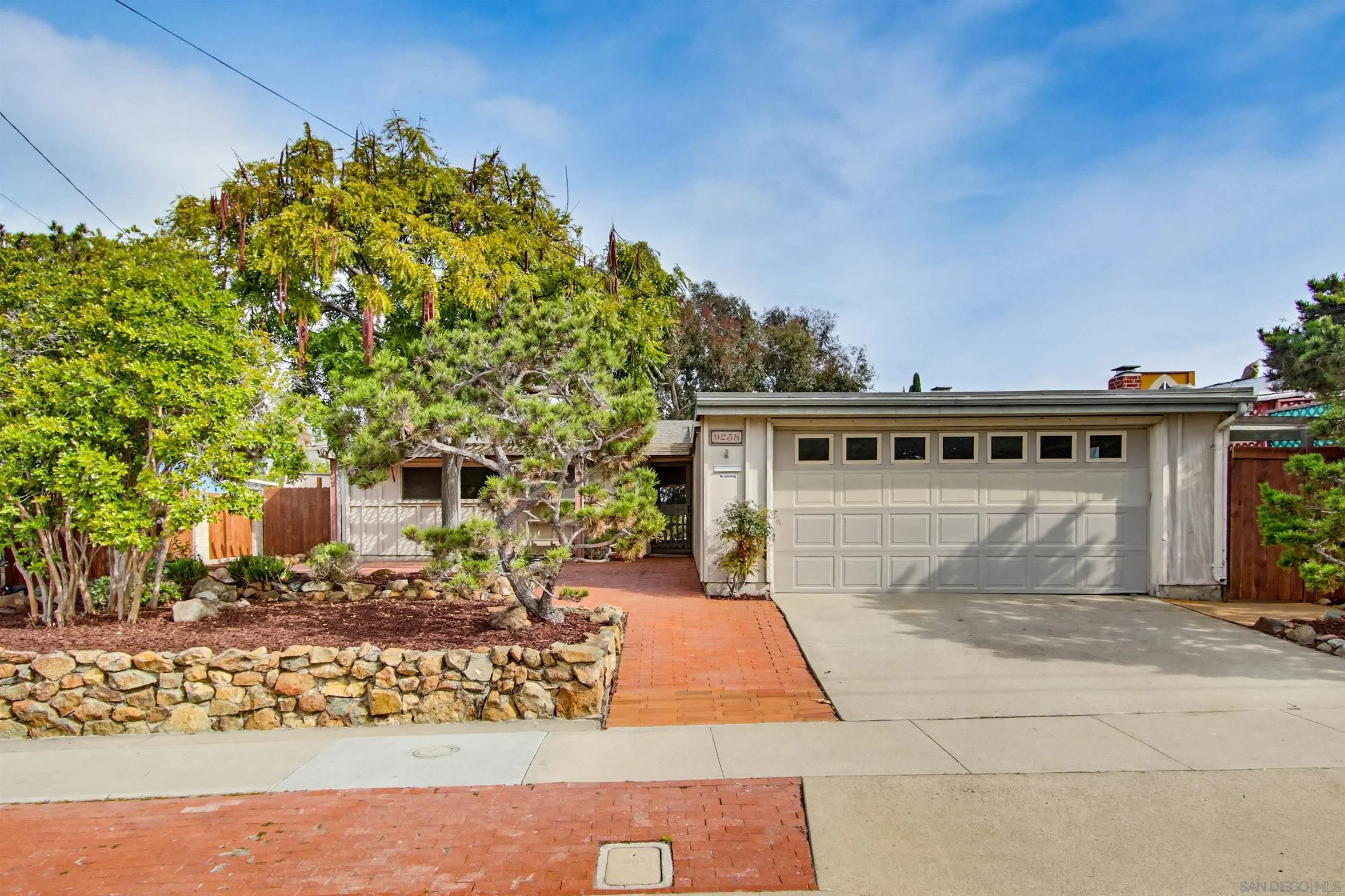 Mid Century in Serra Mesa loaded with potential in a great central SD location.  