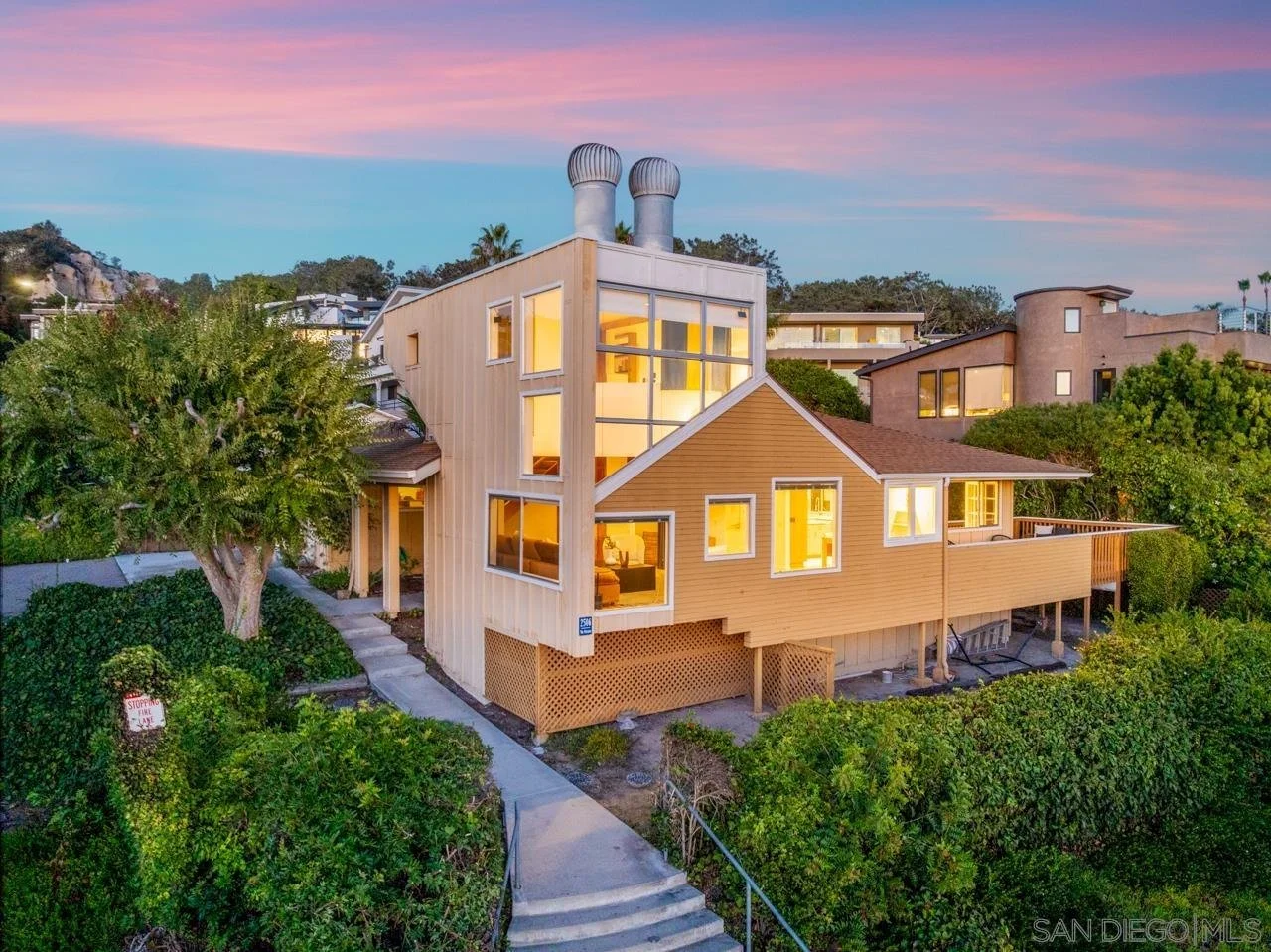 A fascinating early 70s Del Mar home with incredible views and a unique original layout.