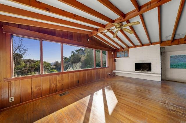 Mid Century home at the base of Mt. Helix offering 3 bedrooms, 1.5 baths, nice views, and great potential. A solid opportunity in a desirable location.