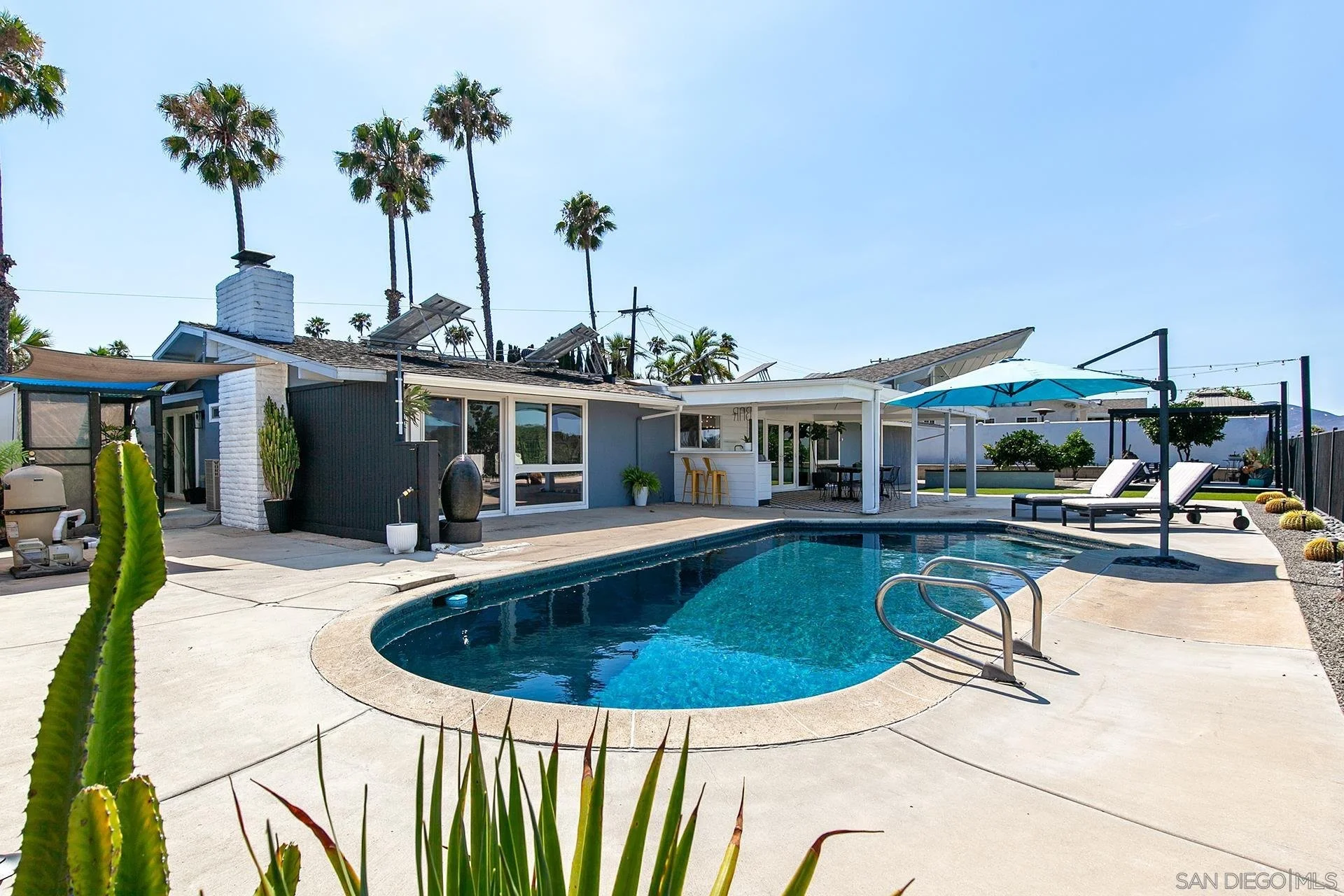 La Mesa Mid Century modern home by Edward Fickett. Nicely updated with original details. Wonderful location and outdoor space (with a pool!)