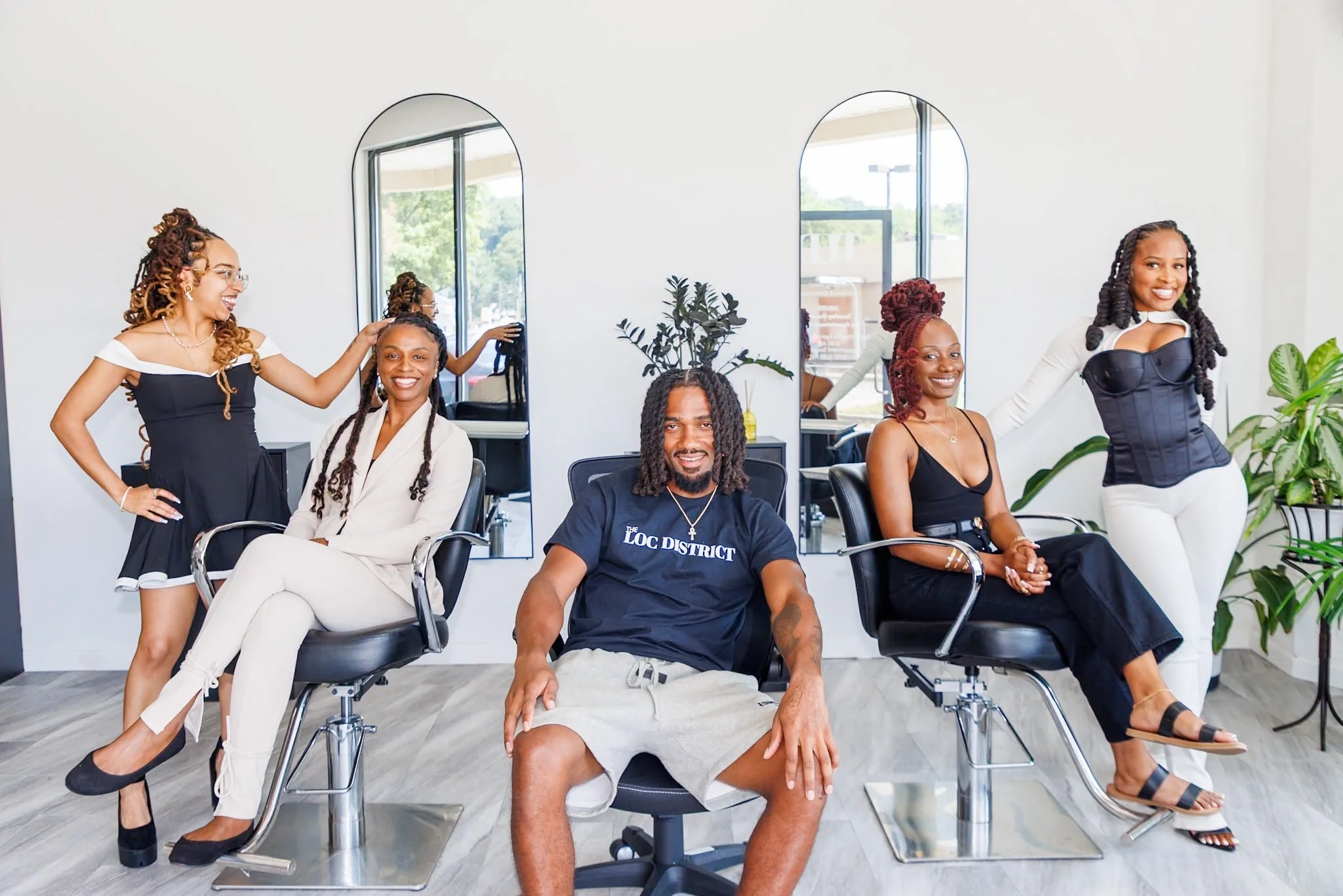 The Loc District team of locticians and stylists inside our Lincoln, Rhode Island loc salon