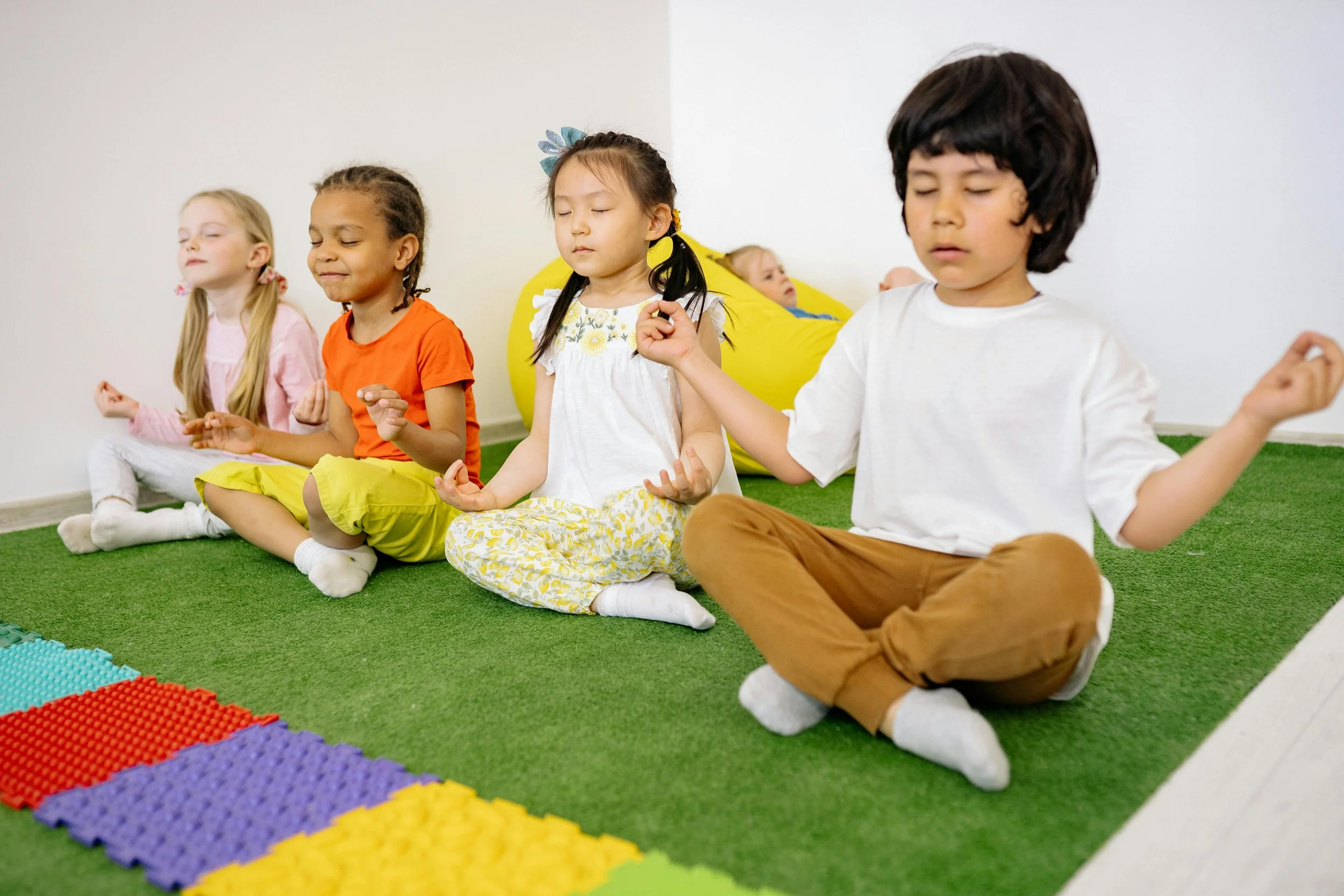 Children practising mindfulness in a therapeutic setting