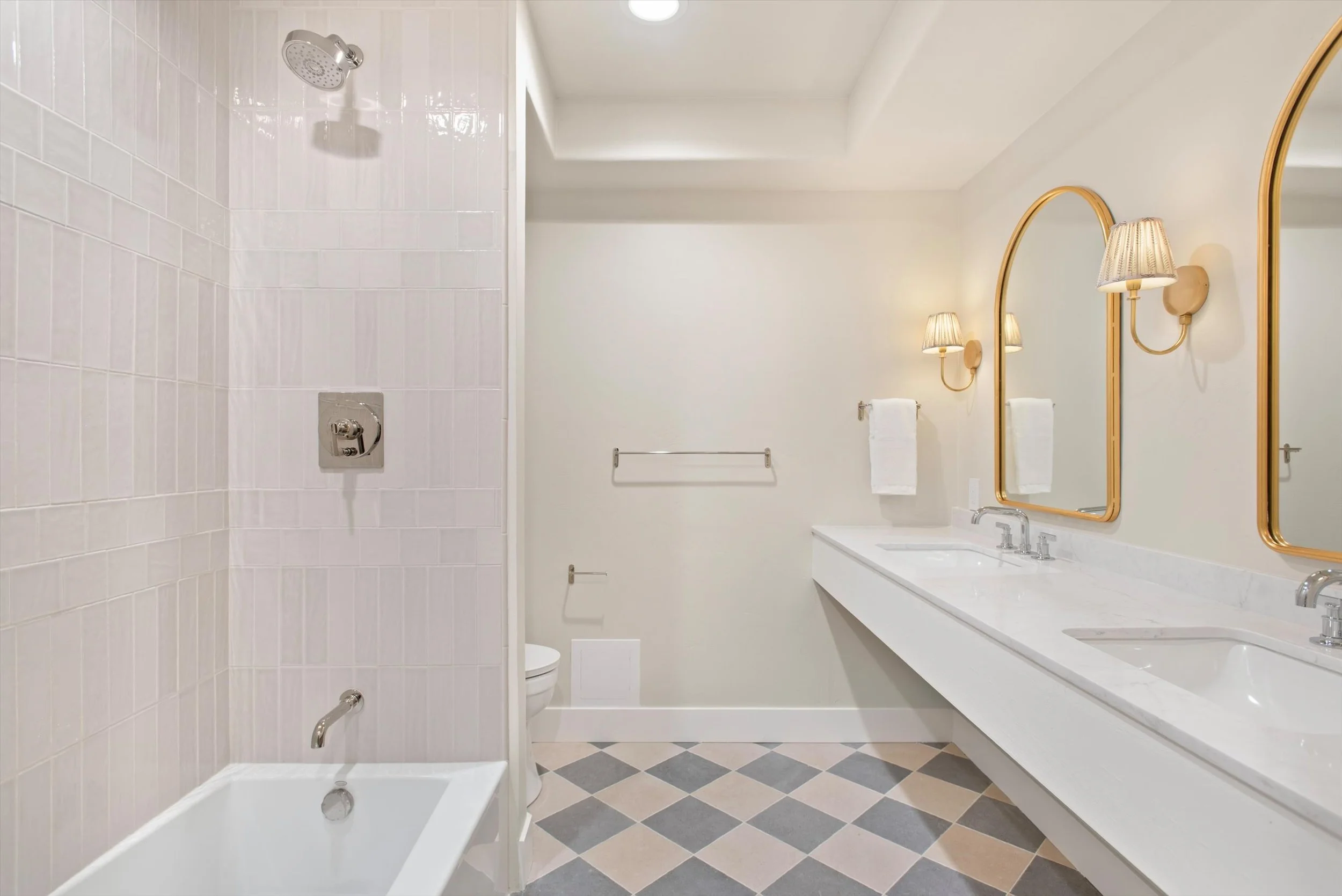 A complete transformation of a dated golf course residence, this renovation brought new life to the home through timeless design and exceptional craftsmanship. Highlights include a fully remodeled kitchen, five renovated bathrooms, custom-finished wa