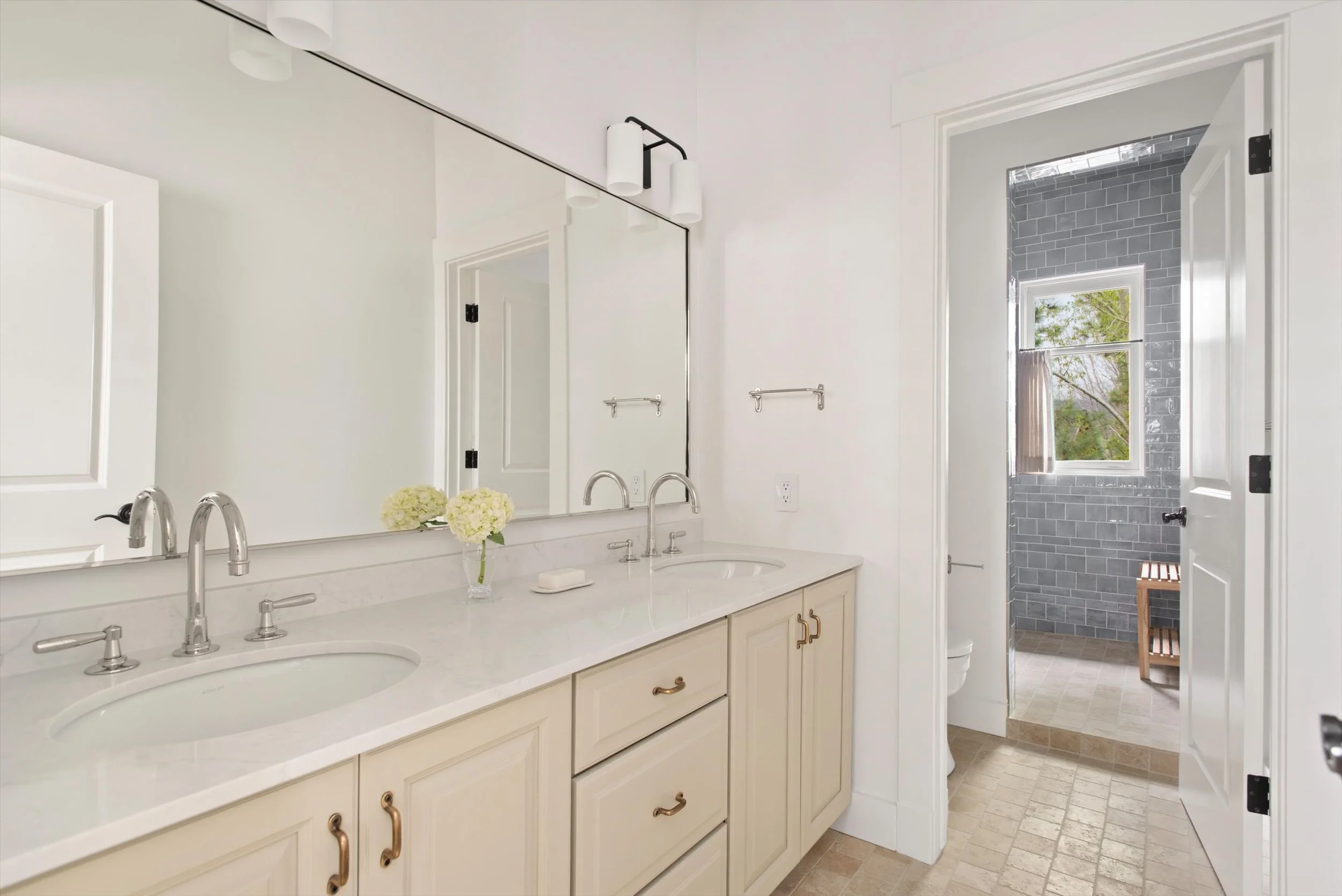 A complete transformation of a dated golf course residence, this renovation brought new life to the home through timeless design and exceptional craftsmanship. Highlights include a fully remodeled kitchen, five renovated bathrooms, custom-finished wa
