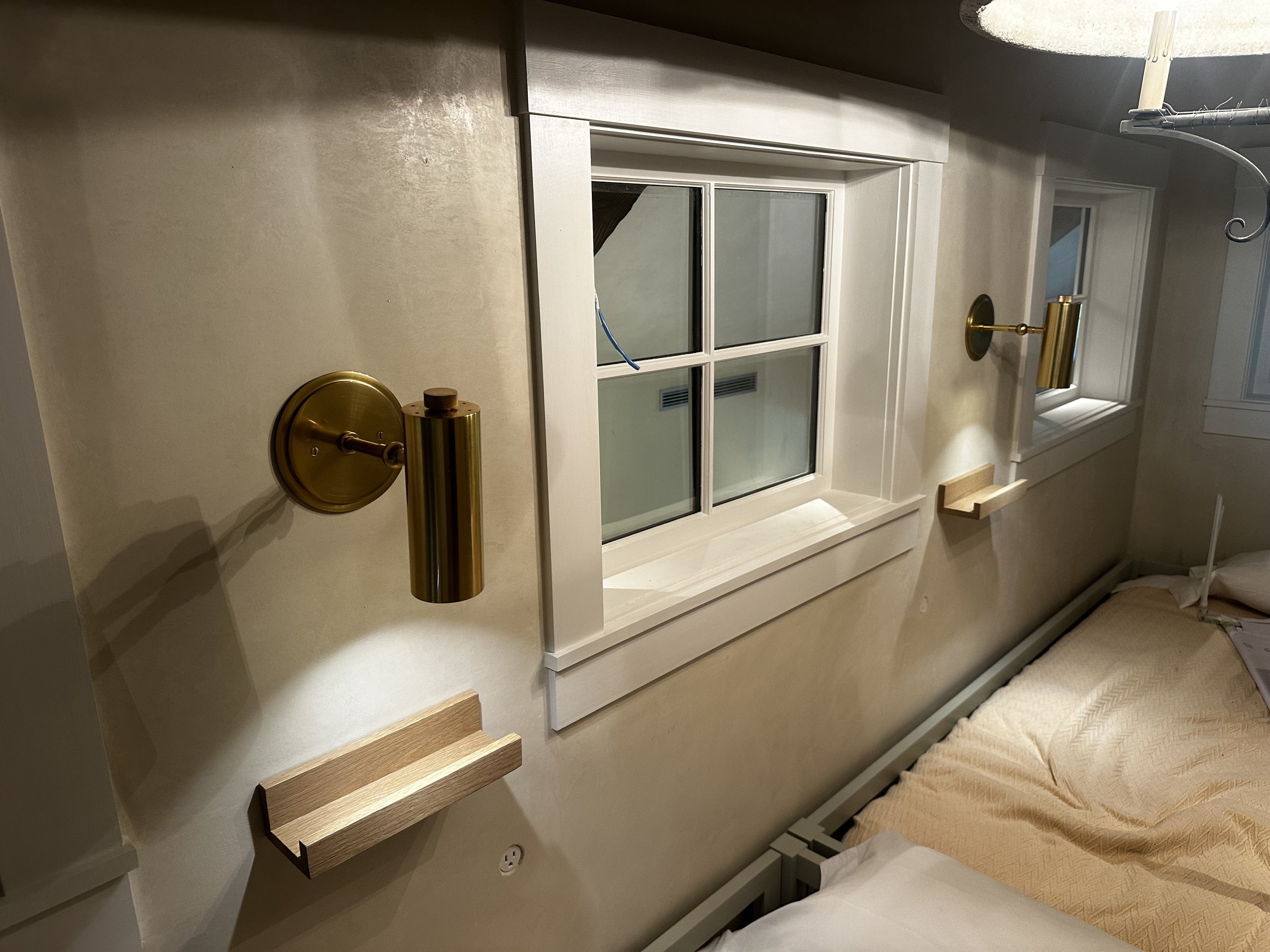 What was once an underutilized room was completely transformed by Smith Works into a warm and welcoming grandkid retreat. This thoughtful addition maximized space with custom built-in bunk beds, durable yet refined finishes, and clever storage solut