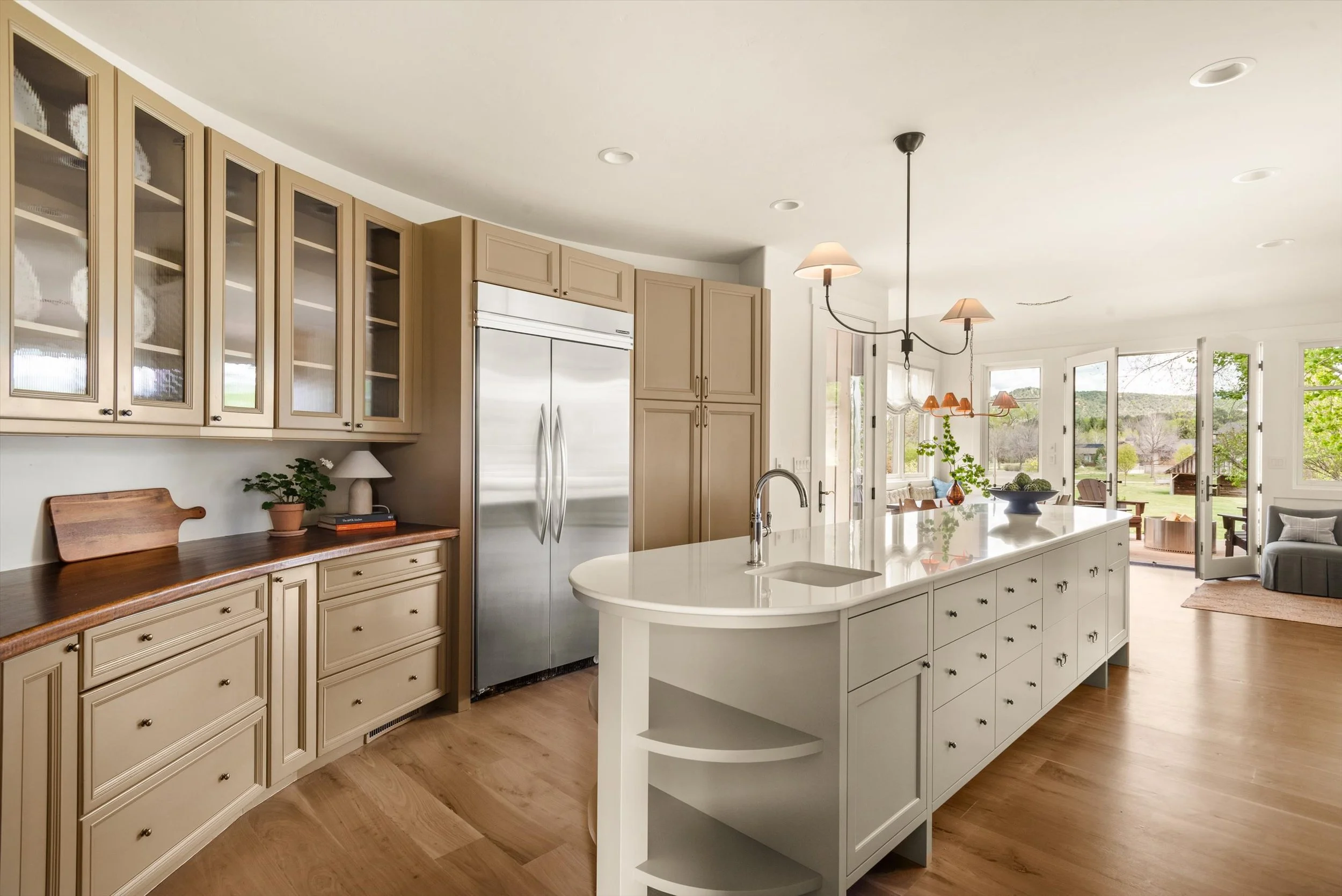 A complete transformation of a dated golf course residence, this renovation brought new life to the home through timeless design and exceptional craftsmanship. Highlights include a fully remodeled kitchen, five renovated bathrooms, custom-finished wa
