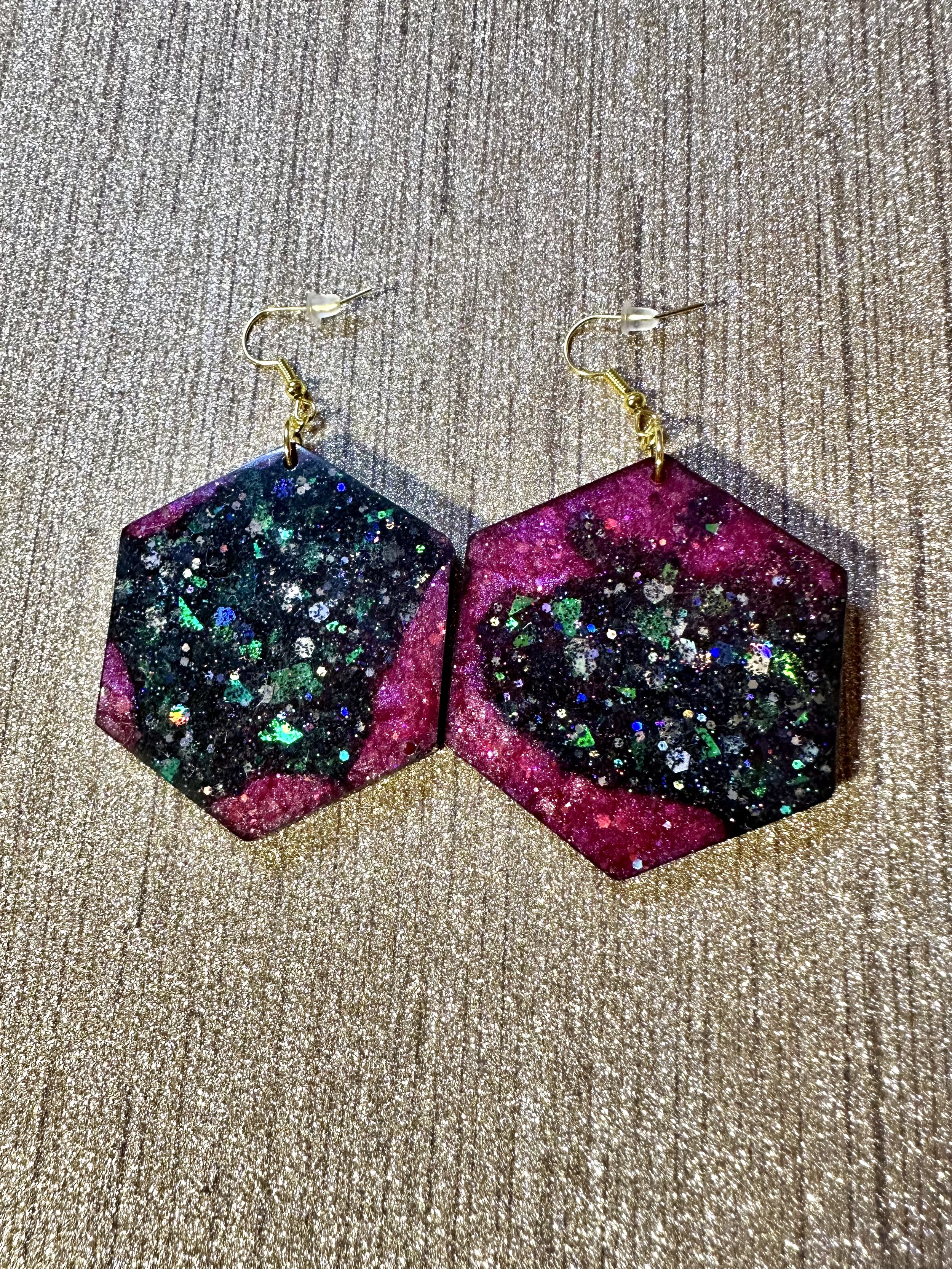 rosy stars deep space hexagon earrings.jpeg