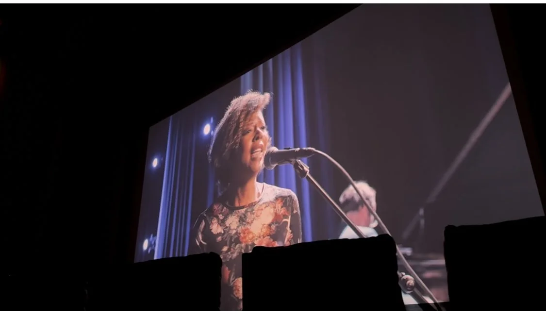 A still from the showing of the KCSM documentary, 2025