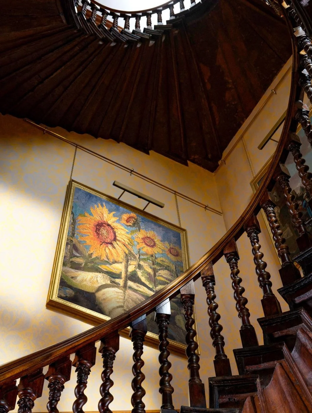 Valeria's art installed along the spiral staircase