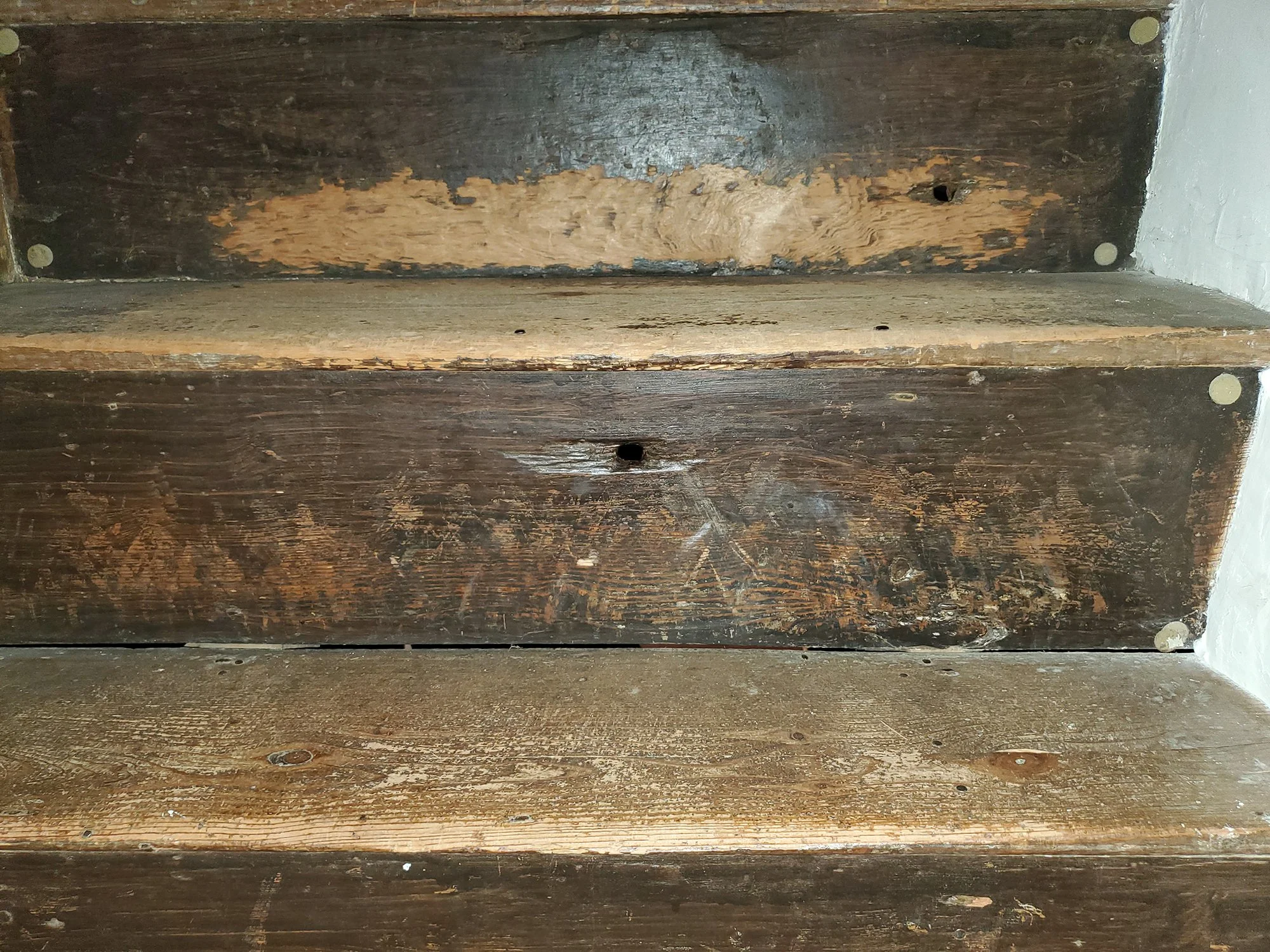 Two exit holes from shots fired by British muskets.jpg