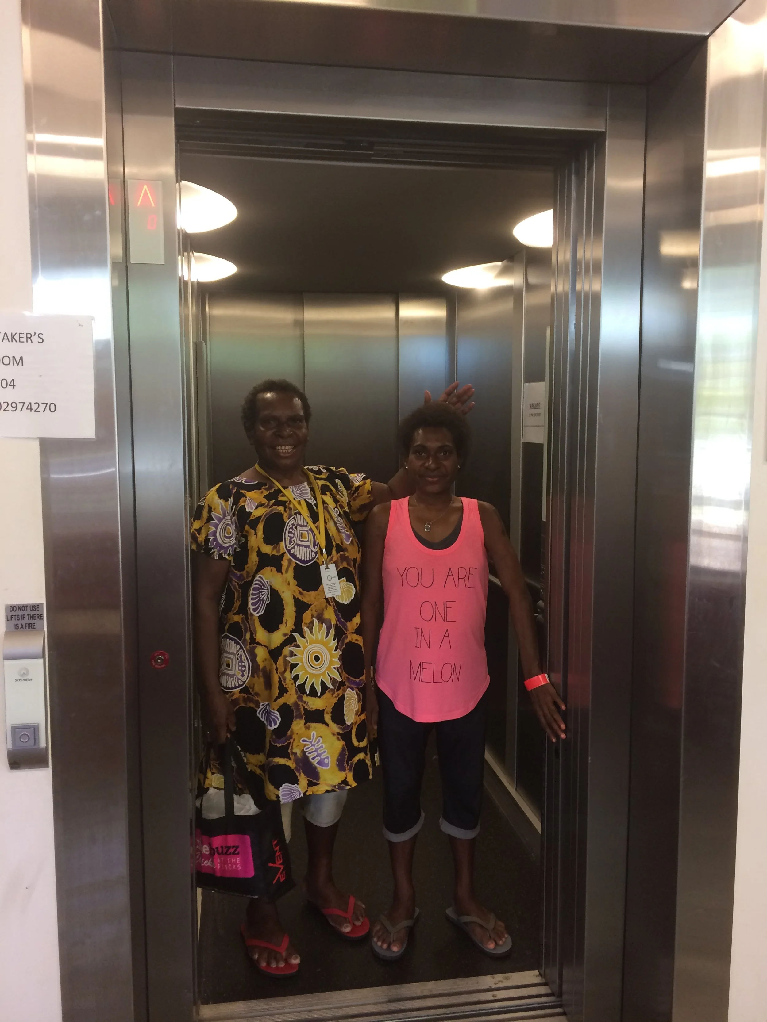 Teaching patients how to use the elevators in the hospital. 