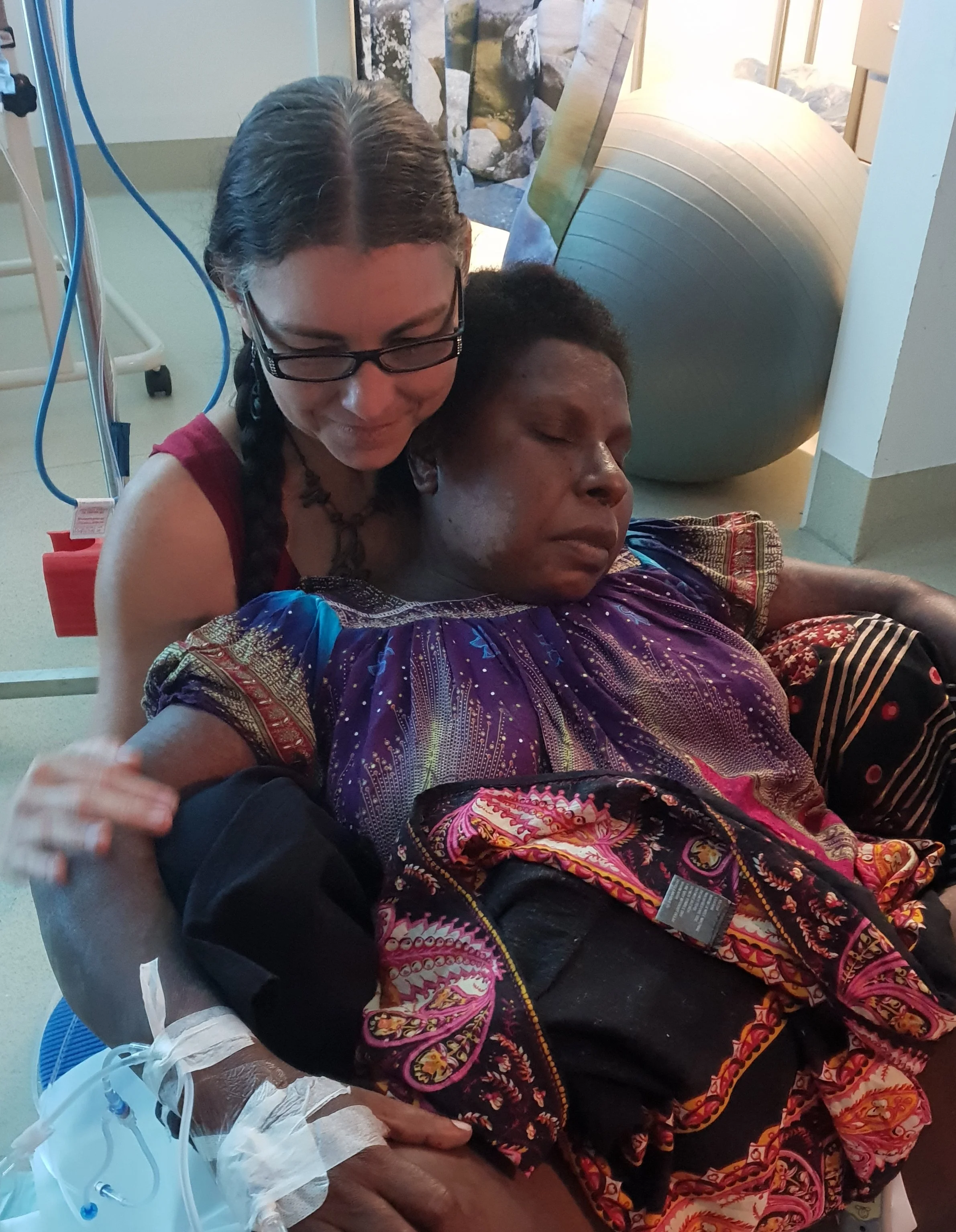 Shelly providing nurturing support to a mother during birth. This mother had complications during pregnancy and travelled to Queensland alone.