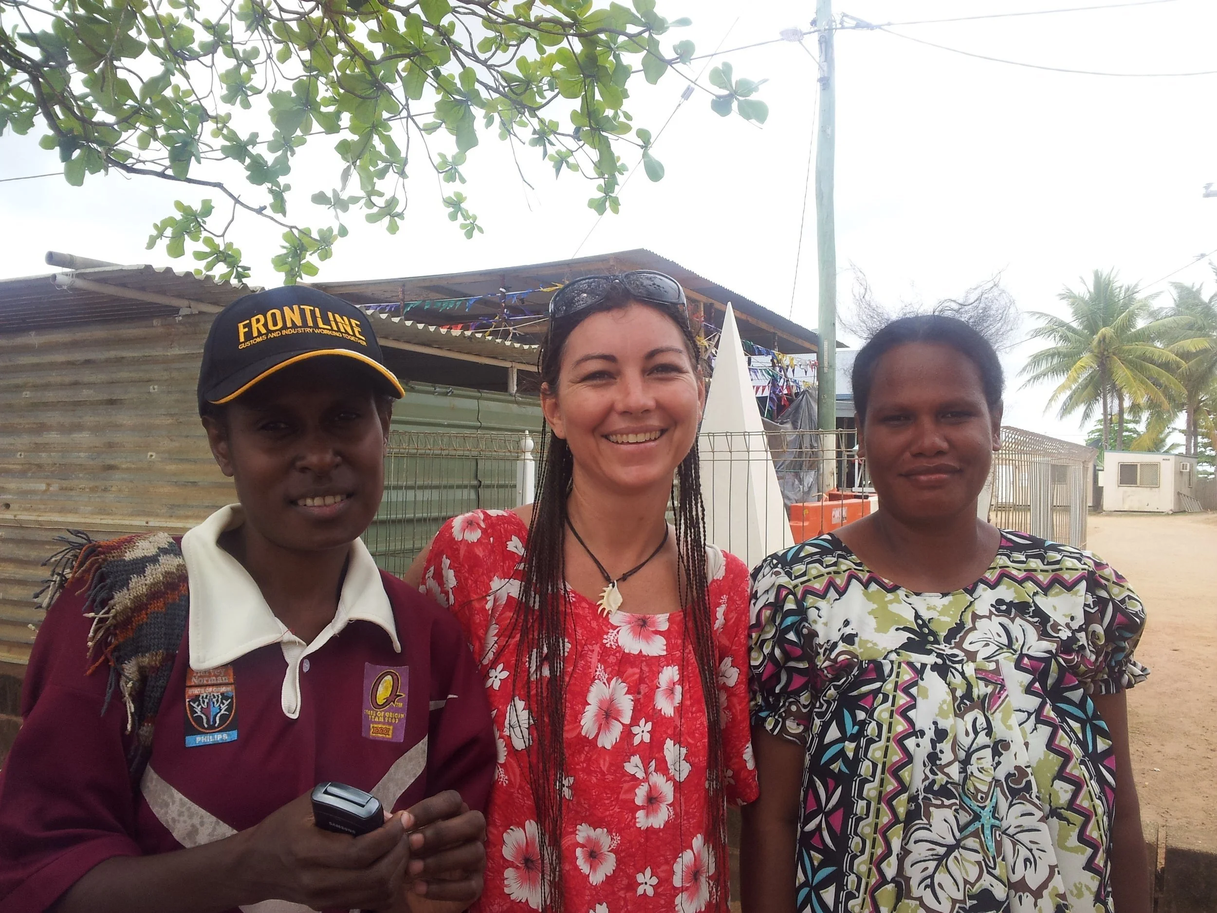 Shelly meeting with Linda the principle of the school and one of the teachers Amake