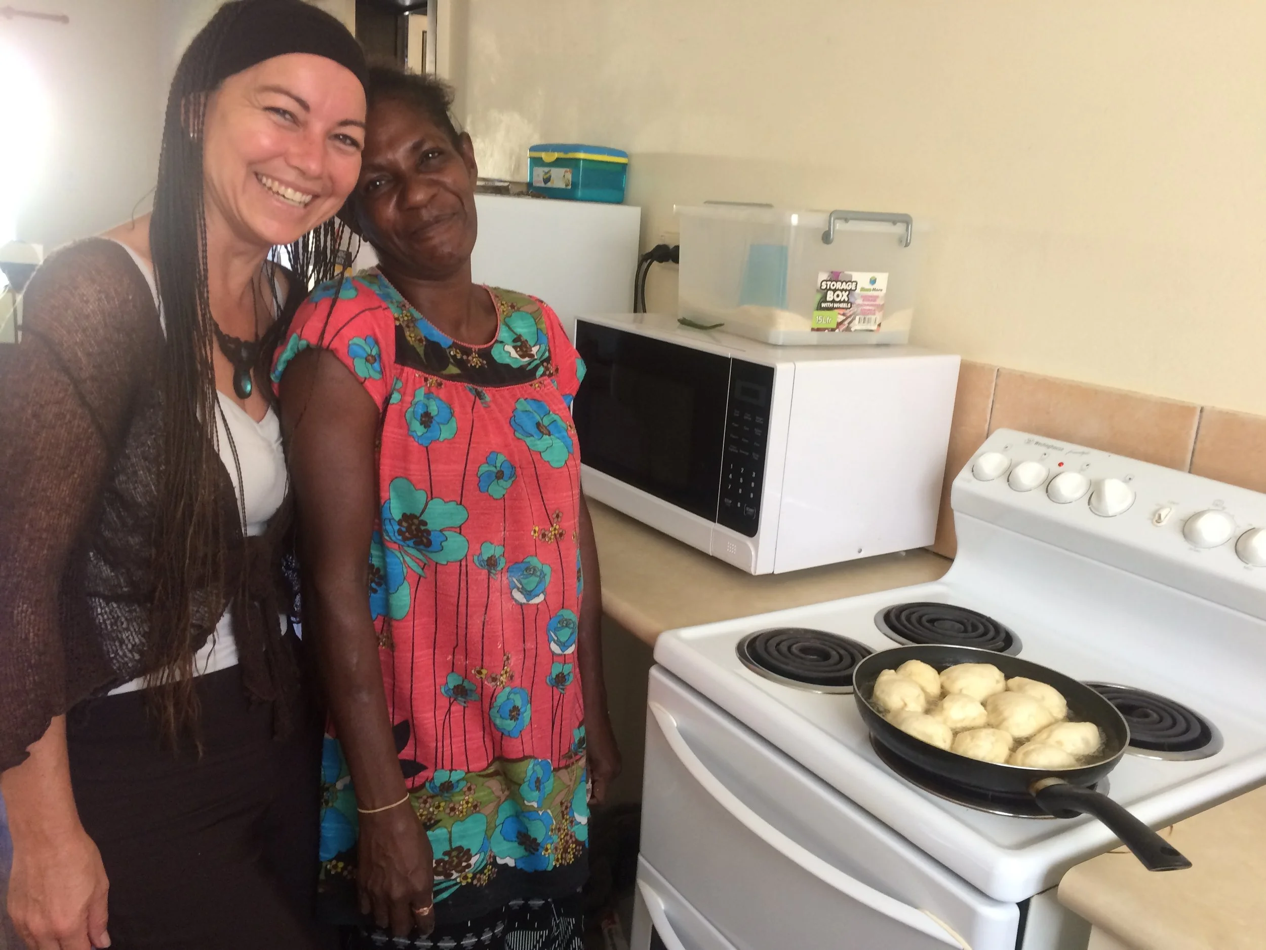Cooking and companionship - using a modern stove top is a change from open fires.