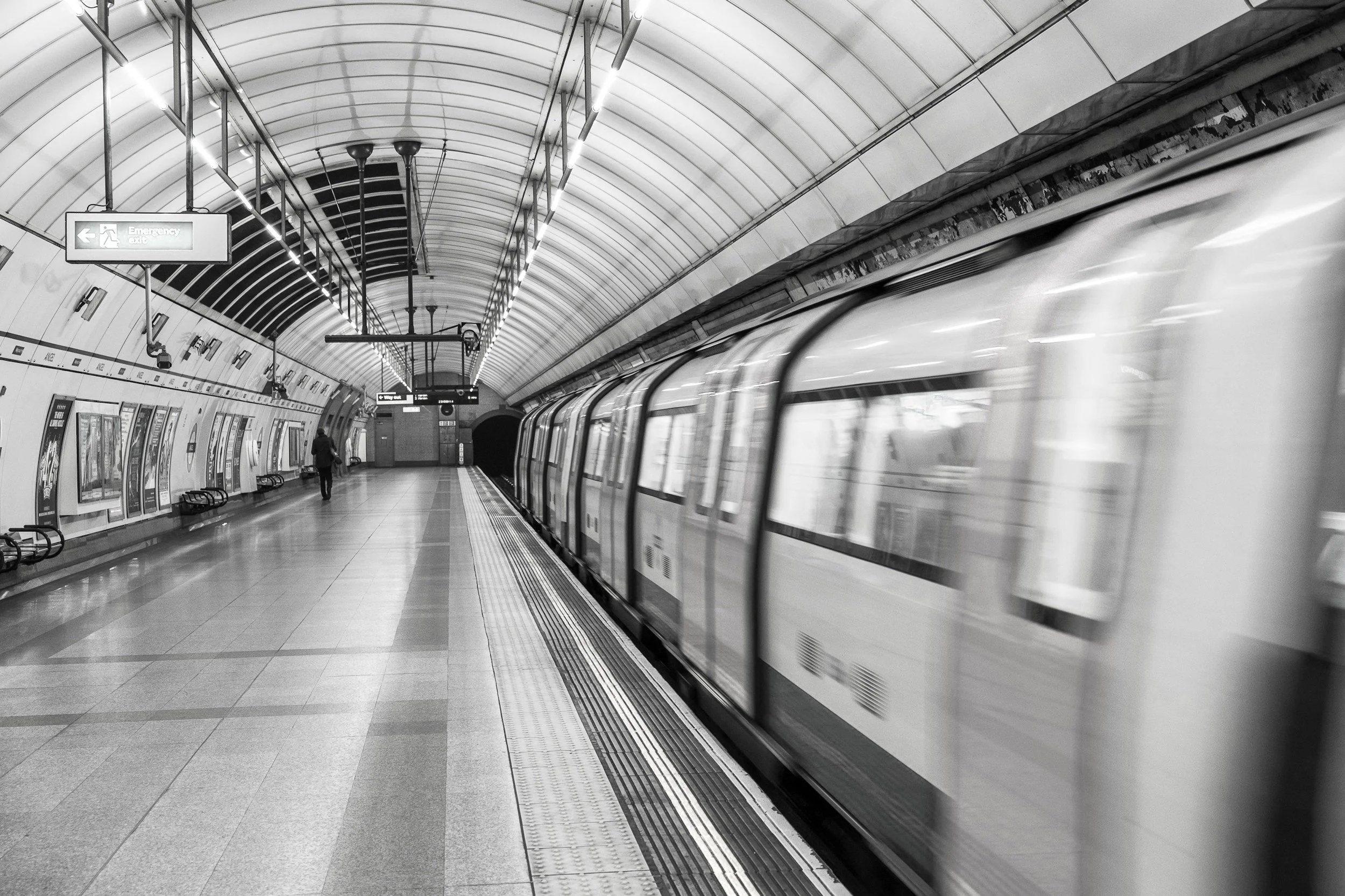Black and white photo of London Tube station.