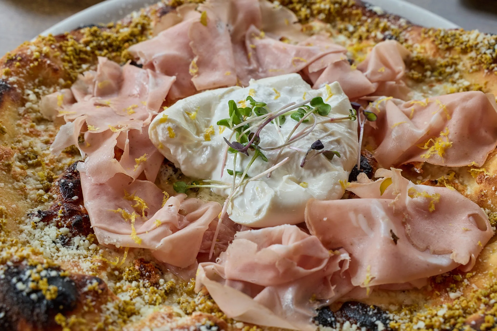 Housemade mortadella pizza with burrata and Italian herbs at LaRosa's Italian Newburyport