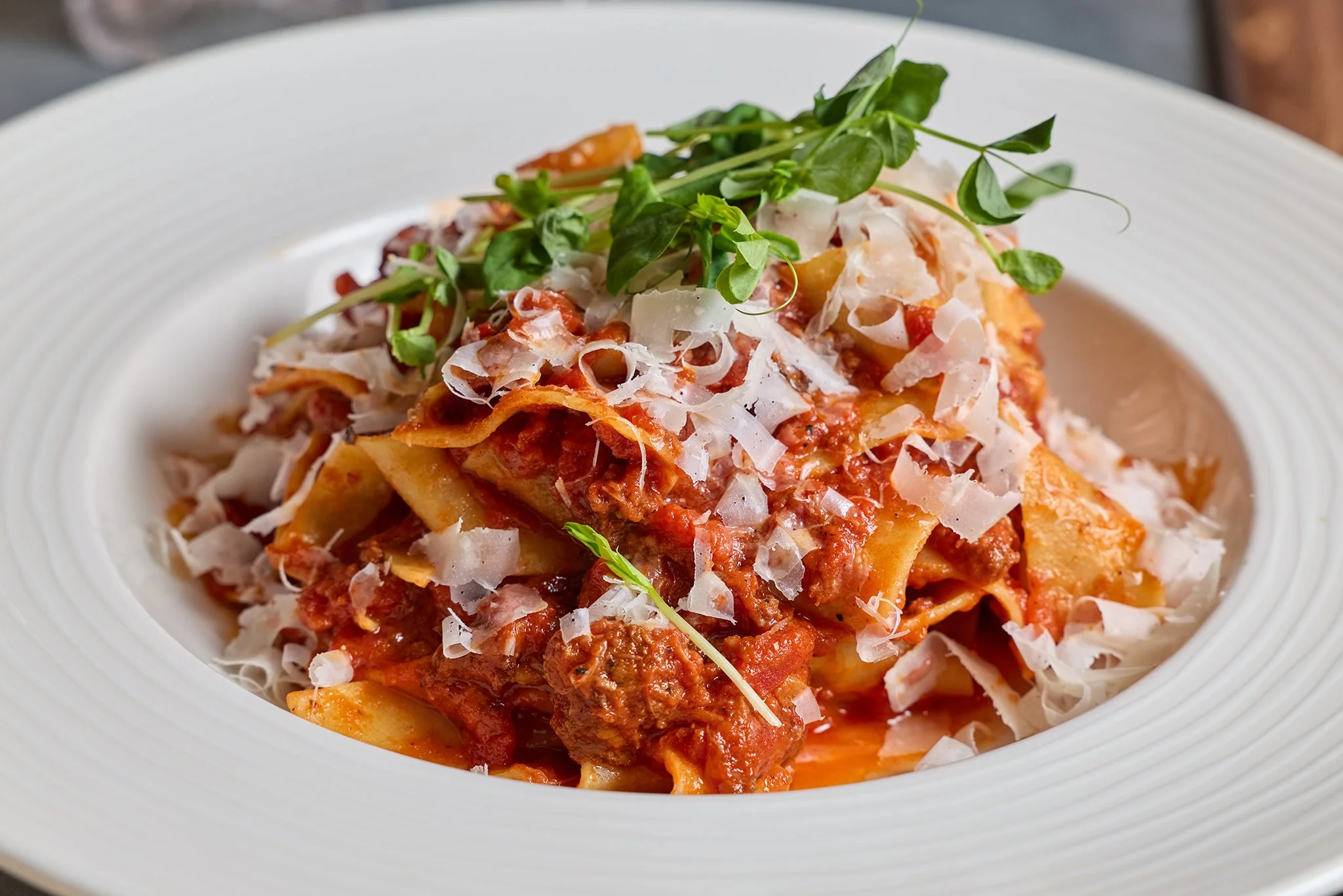 Lamb and short rib bolognese from LaRosa’s Italian restaurant – housemade pasta, slow-braised meats, holiday catering dish