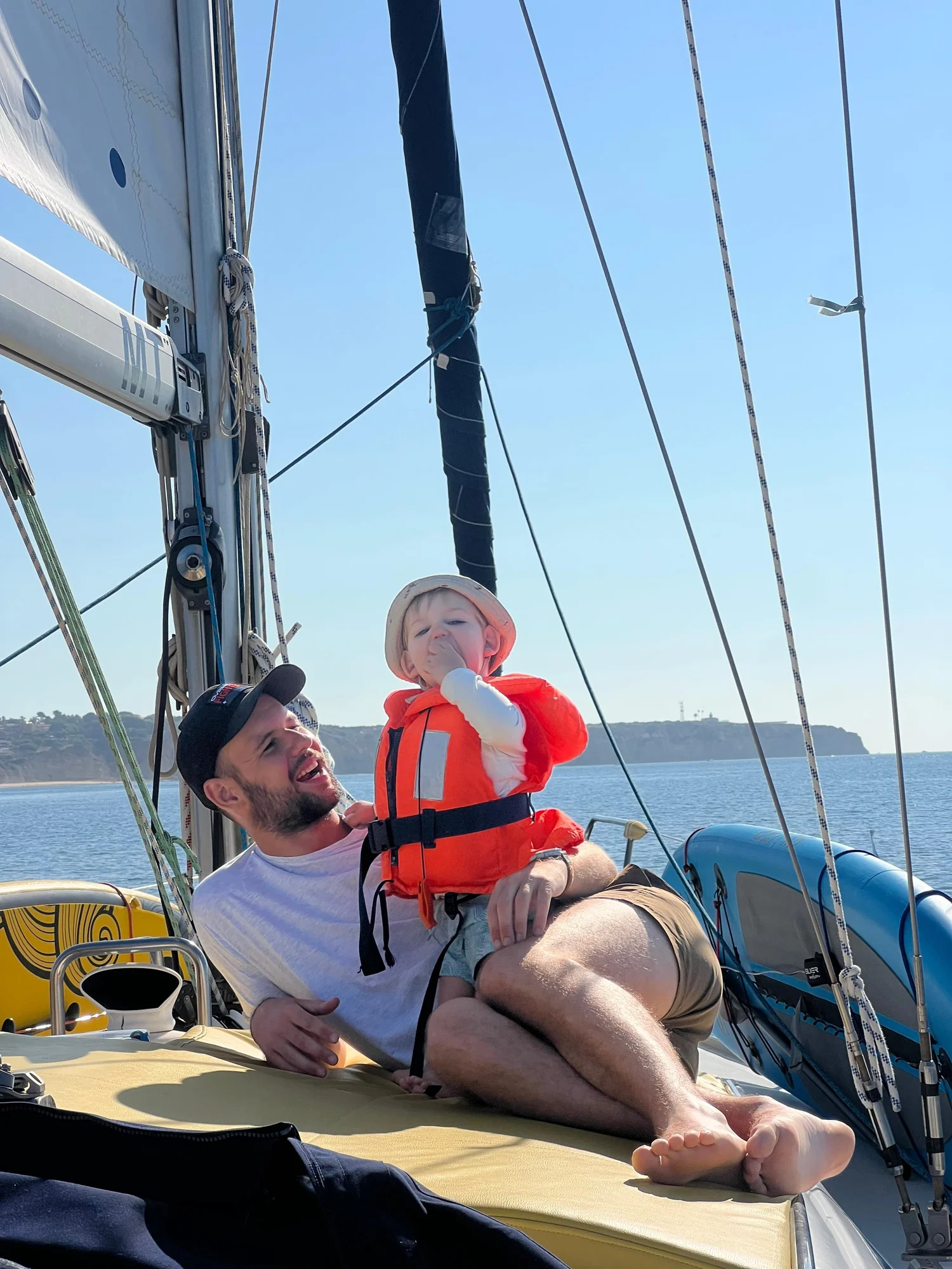 Father and child on a sailboat
