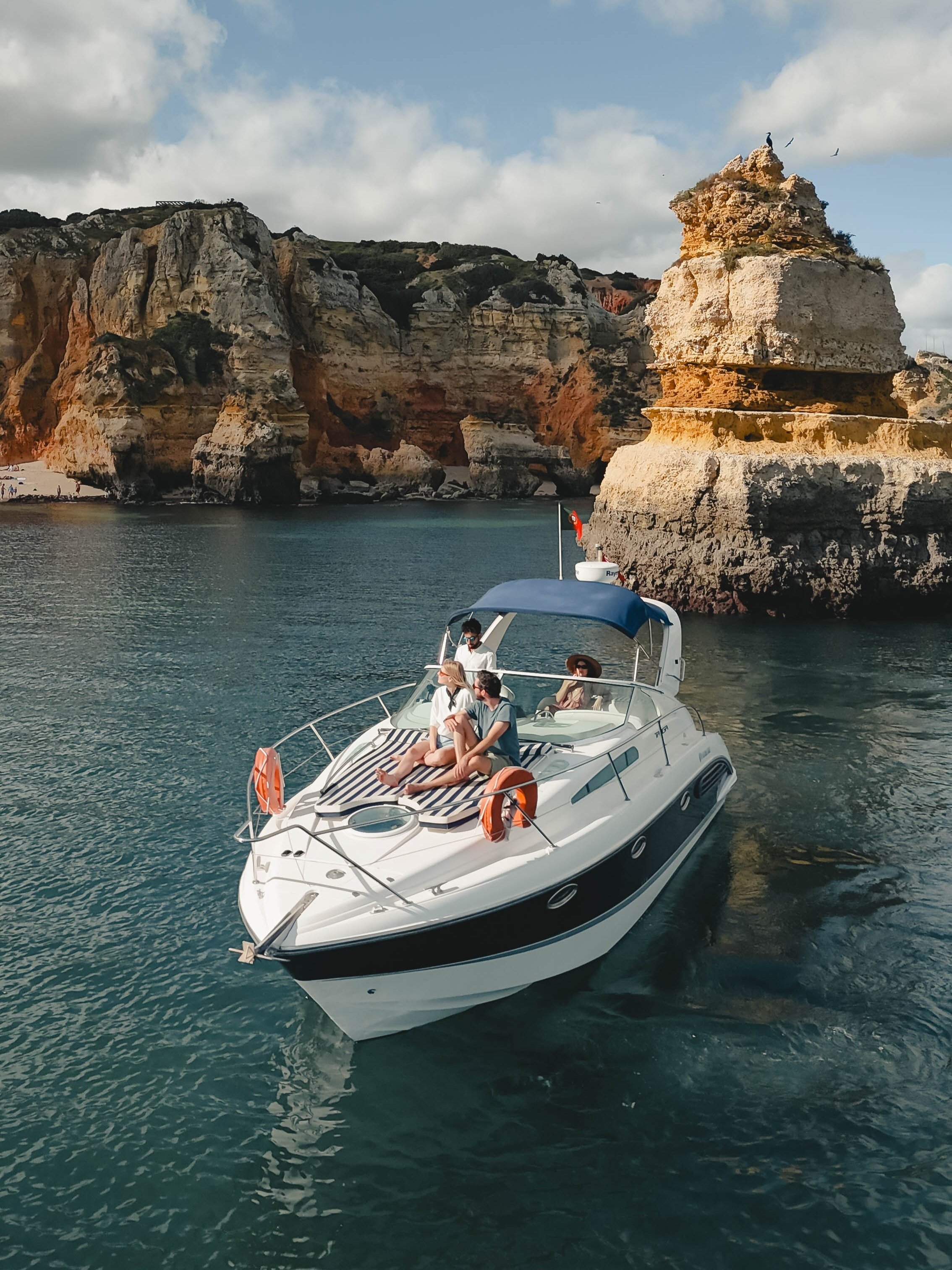Motorboat near the rock formations of Ponta da Piedade