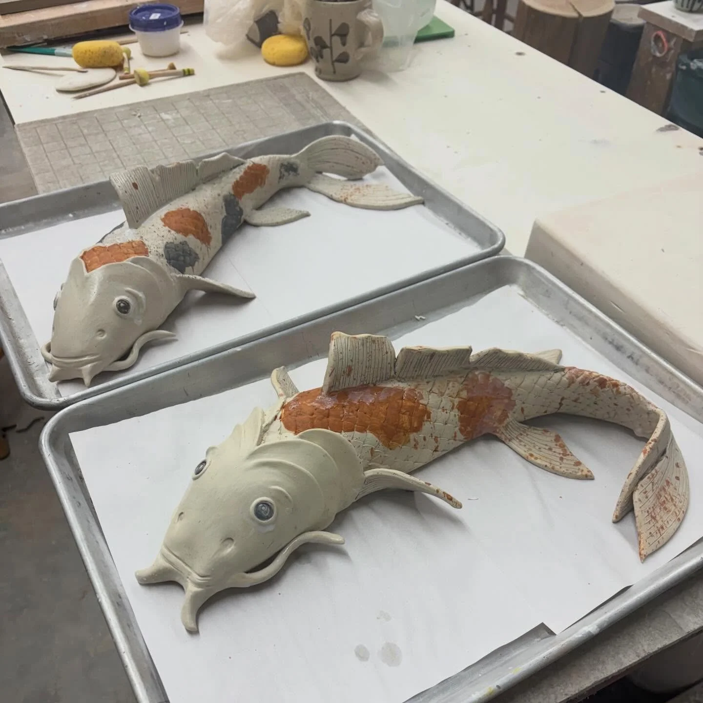 Hand building in porcelain&hellip;. is a choice. But I couldn&rsquo;t resist going life size. Flinging colored slip was probably my favorite part. 
Drying oh-so-slowly and manifesting a kiln miracle for these two!