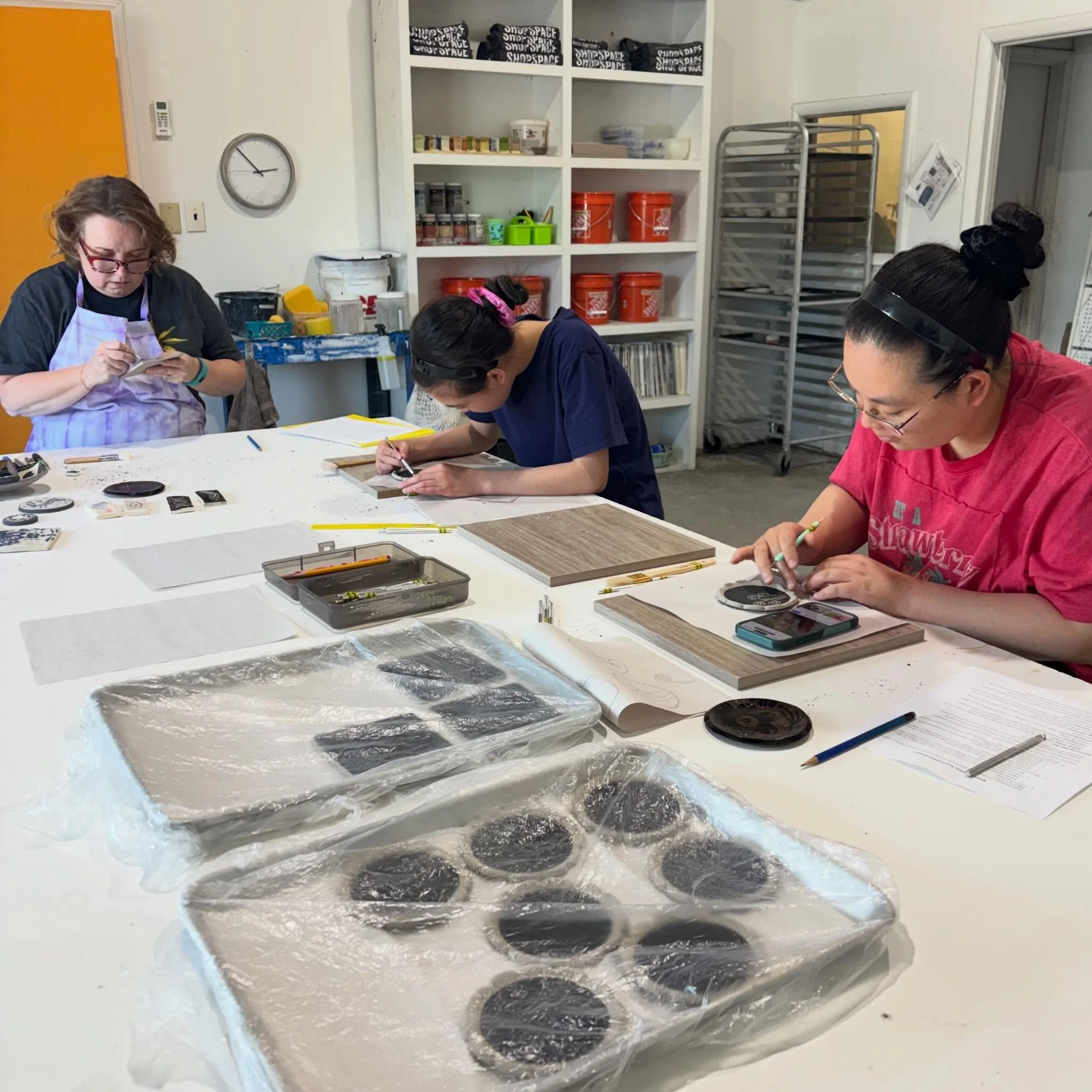Such a great afternoon exploring sgraffito with guest instructor, @amyscreativelife 

This technique is so versatile - layering slip, carving through, and watching patterns and illustrations come to life. These adorable coasters are headed to the kil