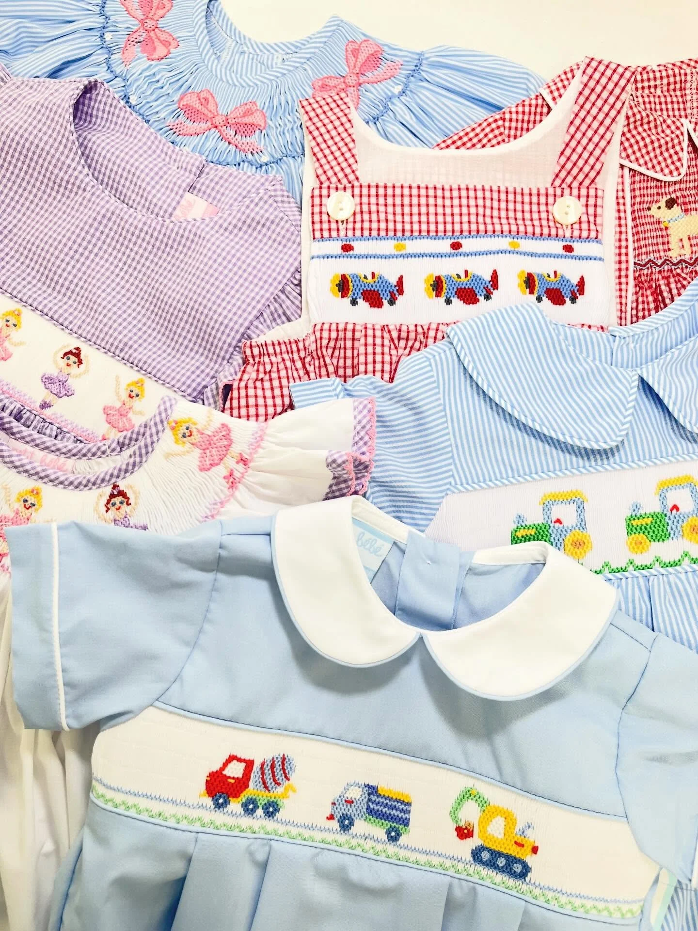 Adorable smocks! Tap to shop! #shopoverthemoonchildren #smockedclothing