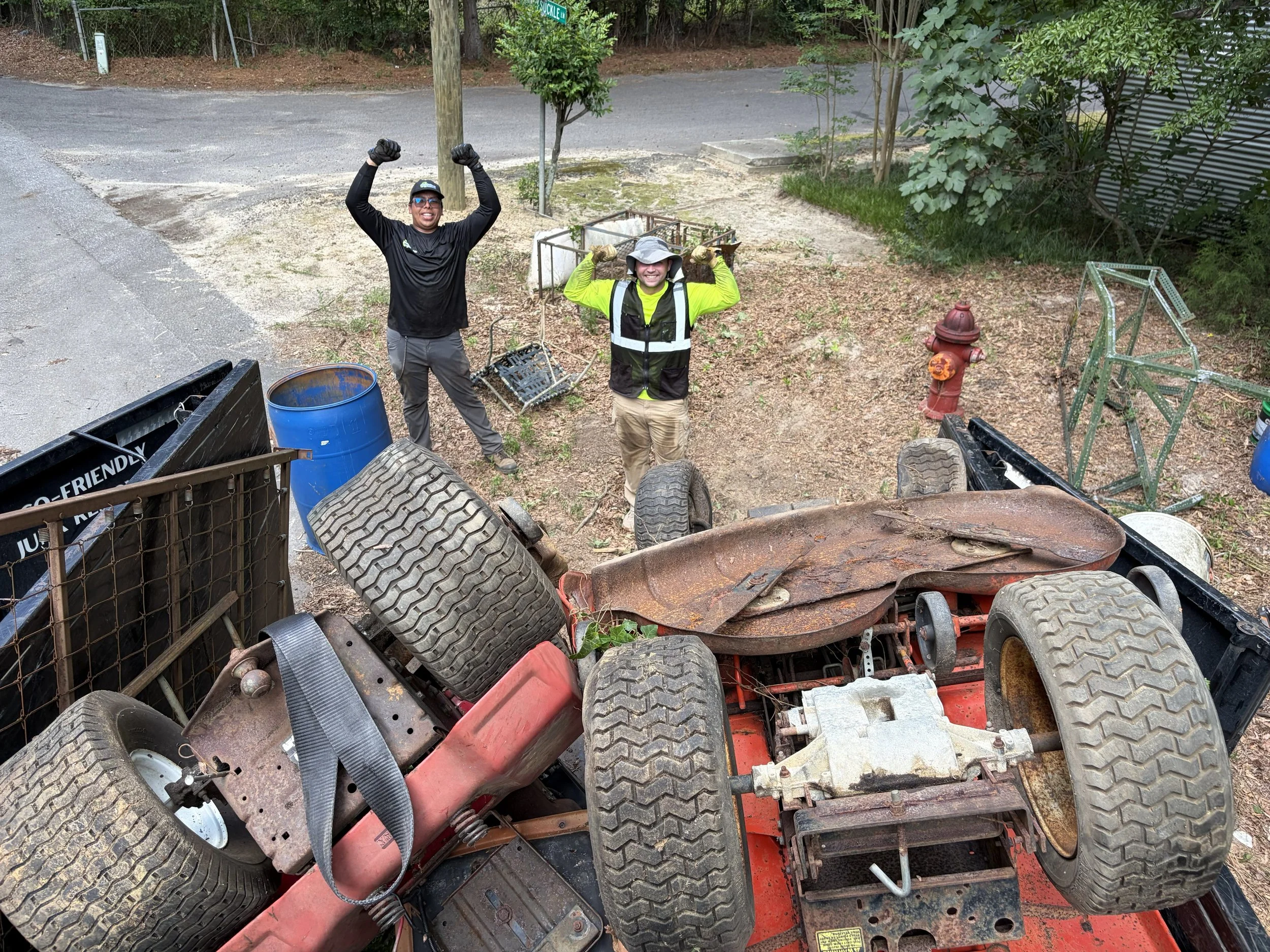 Team from Great Exchange Junk Removal Loading Junk Trailer