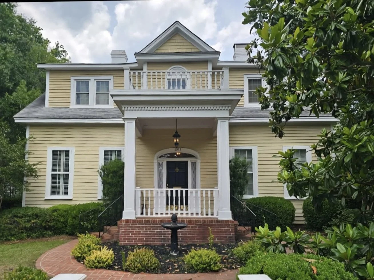 A large nice home that is an estate that has been cleaned out with many valuable items sorted, packed, and taken to auction during an estate cleanout service.