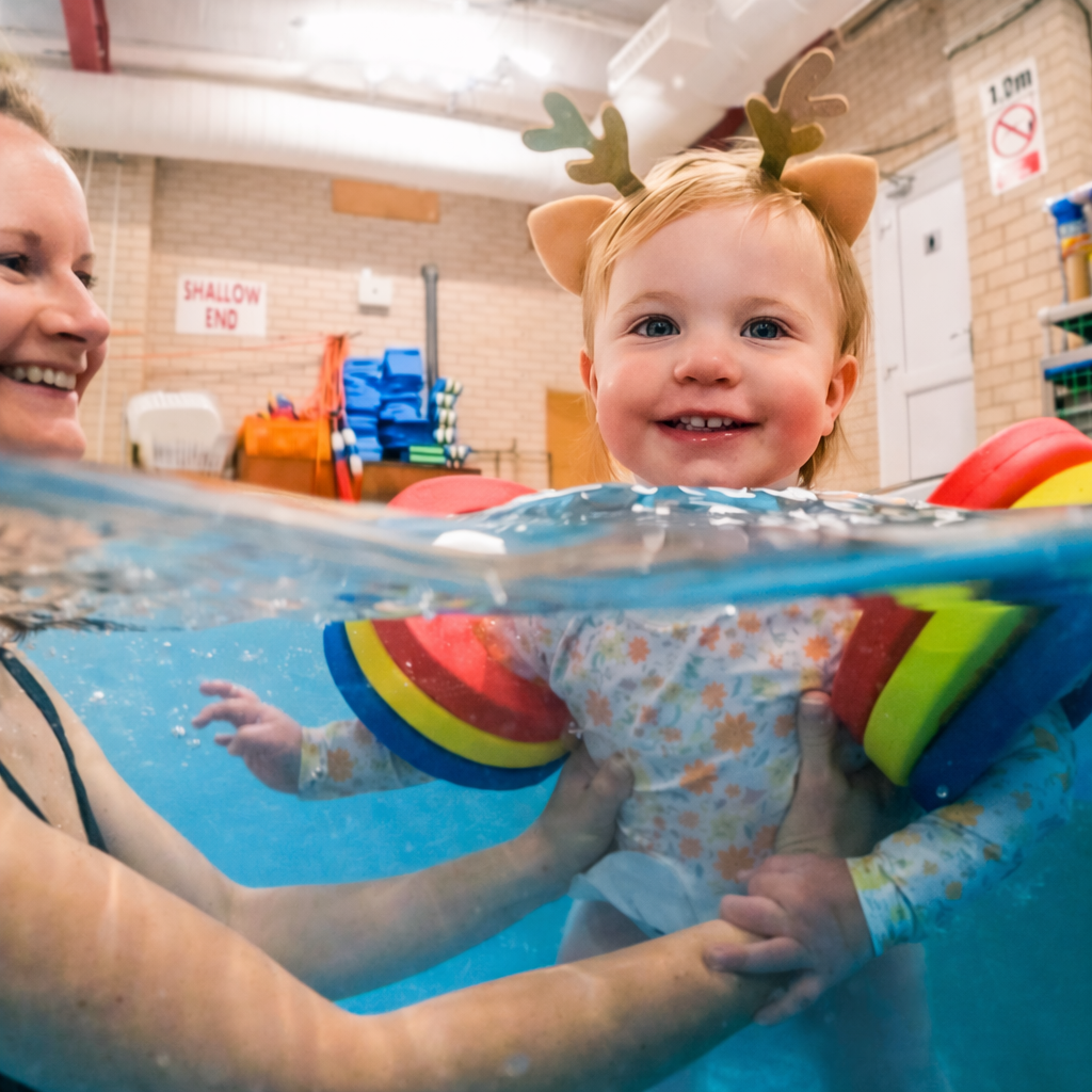 Adult and baby swimming lessons in Dorset helping infants build water confidence