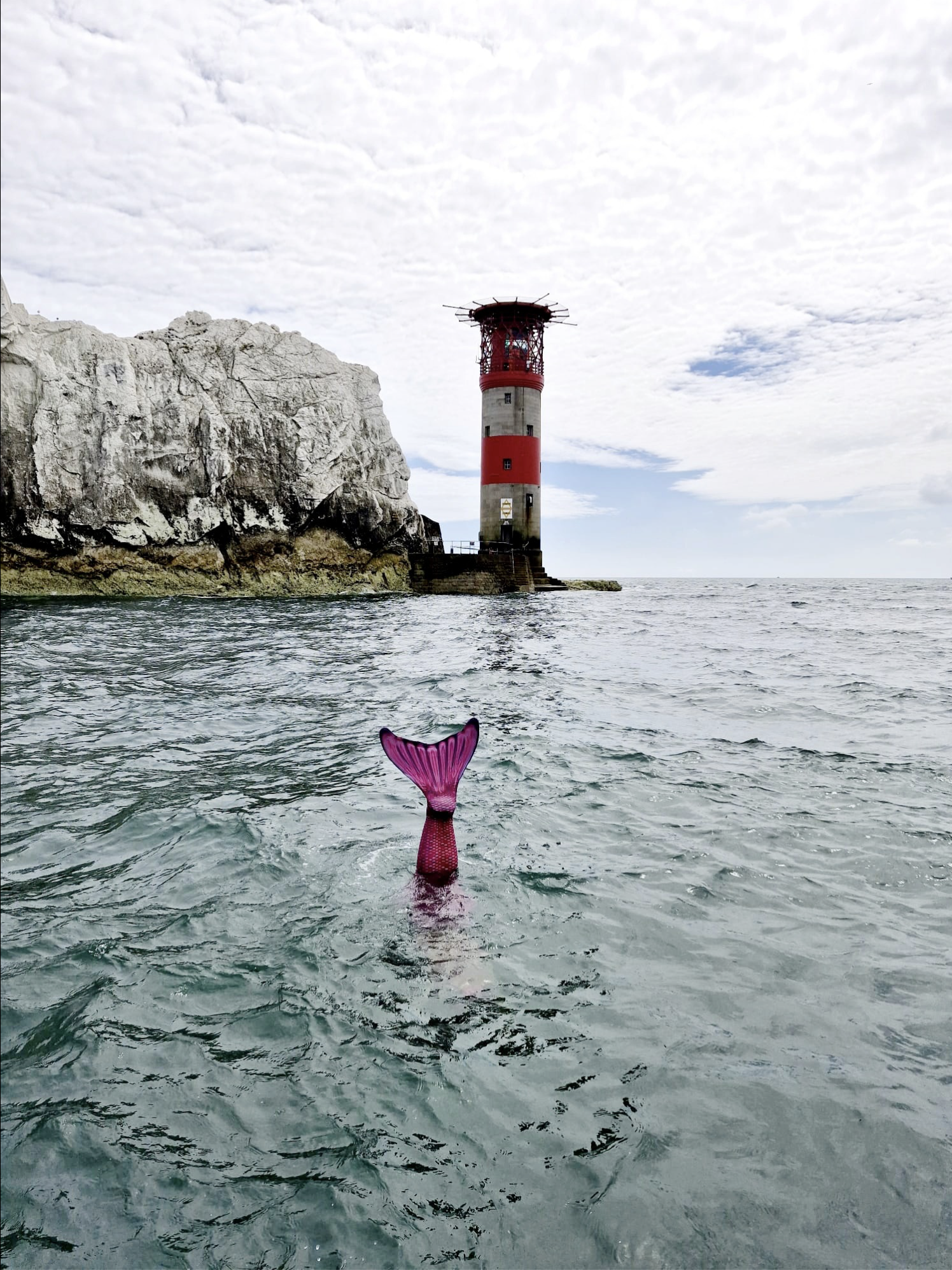 Mermaid swimming challenge around Brownsea Island in Dorset raising money for charity