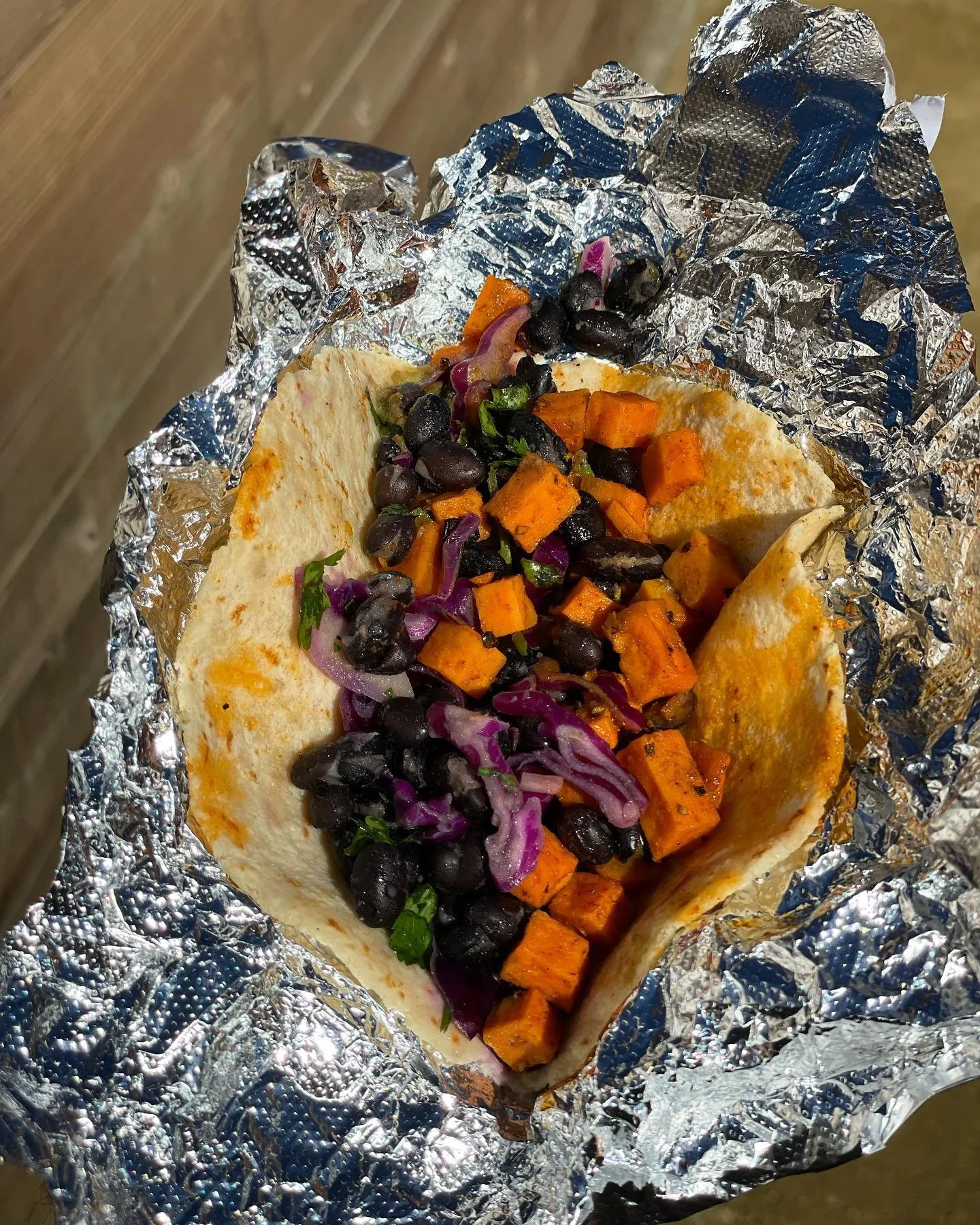 We’re putting the finishing touches on our lunch menu. It’s tasty and full of traditional and new taco combinations. This roasted sweet potato taco topped with purple cabbage & black bean slaw and avocado is a serious sleeper. It&rsqu