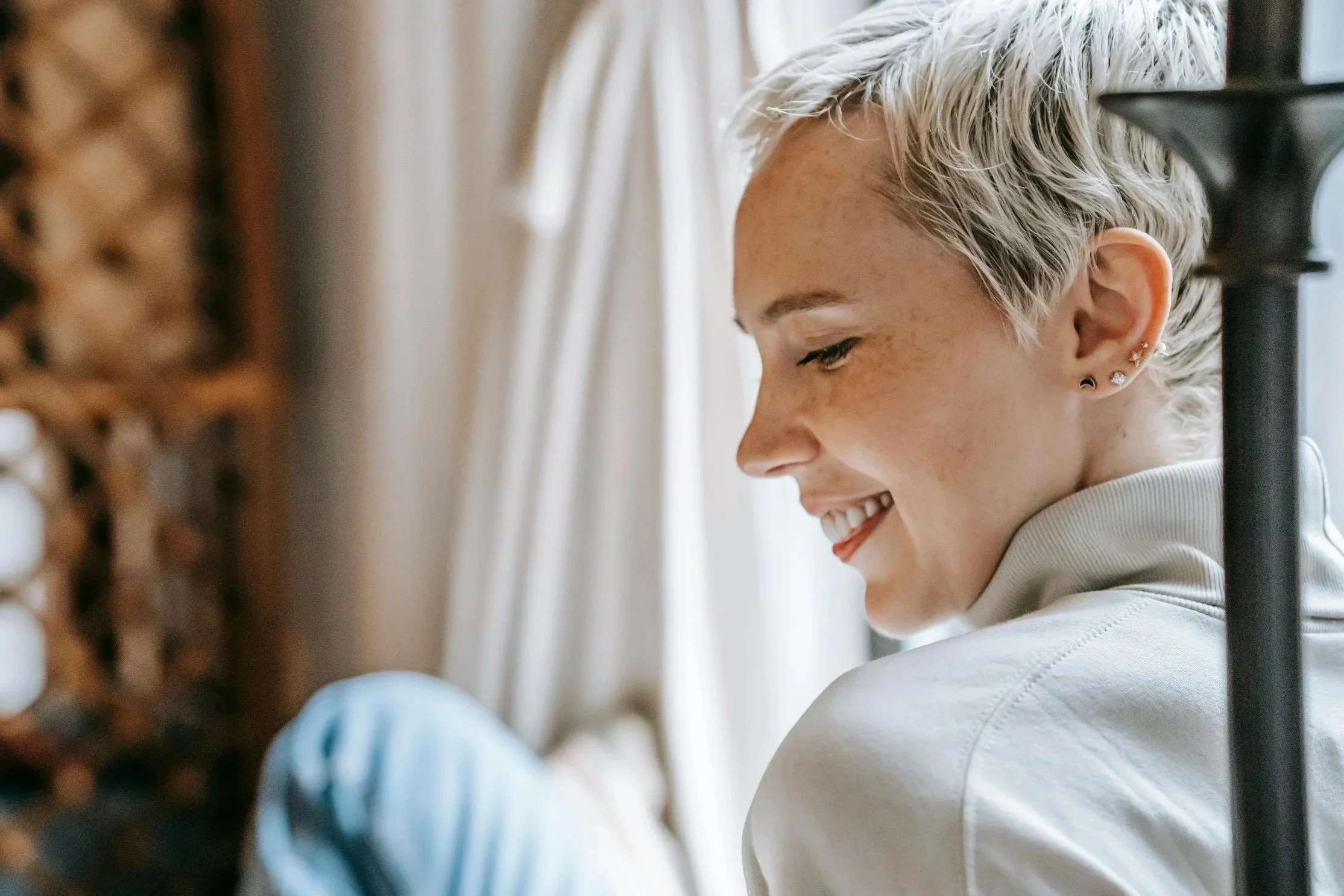 woman smiling with short gray hair