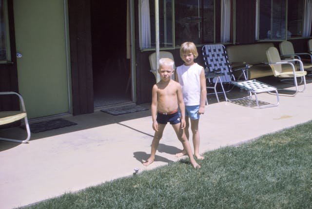 A picture of two children from the 1970's