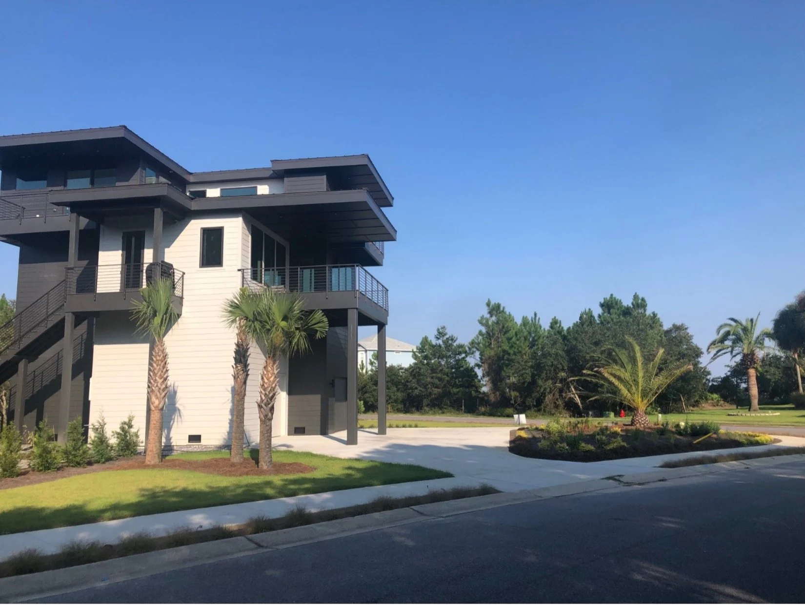 Modern beach or vacation house construction including interior design located in Gulf Breeze, Florida designed by the architecture firm Born Architects, which serves the northwestern Florida area including Port St. Joe, Gulf Breeze, St. George Island