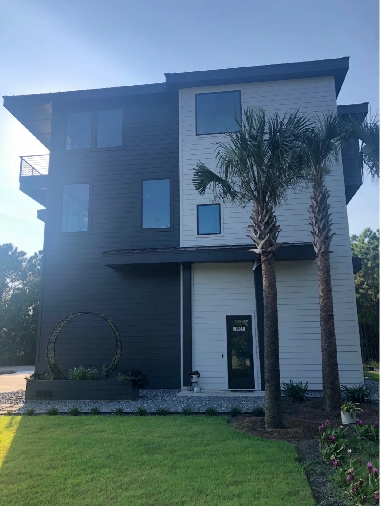 Modern beach or vacation house construction including interior design located in Gulf Breeze, Florida designed by the architecture firm Born Architects, which serves the northwestern Florida area including Port St. Joe, Gulf Breeze, St. George Island