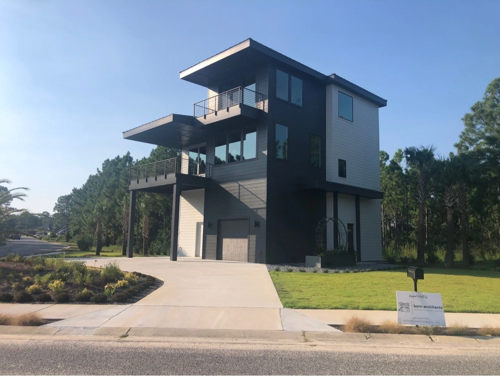 Modern beach or vacation house construction including interior design located in Gulf Breeze, Florida designed by the architecture firm Born Architects, which serves the northwestern Florida area including Port St. Joe, Gulf Breeze, St. George Island