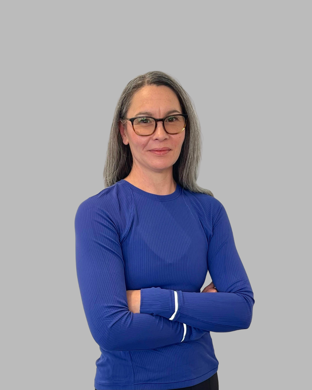 Text saying "Janine Didyk" on a dark blue background.