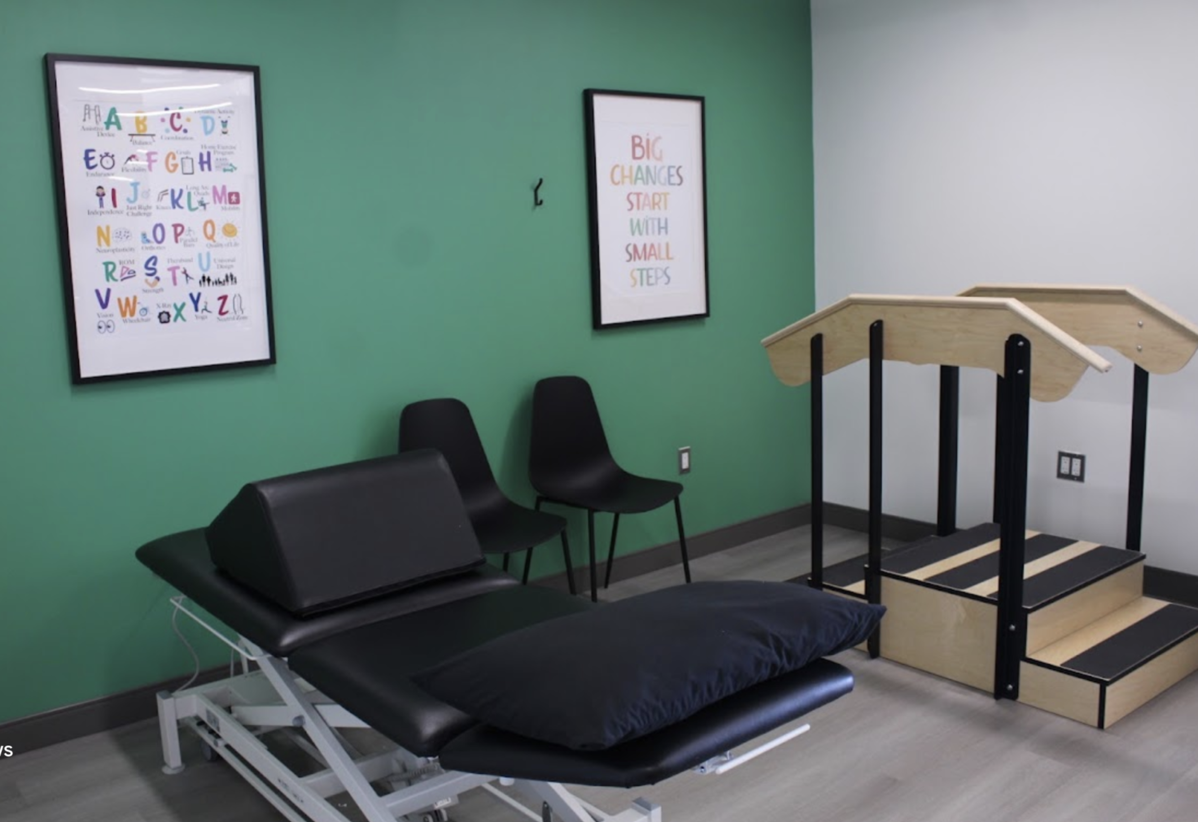 Pediatric therapy room with treatment table and training stairs