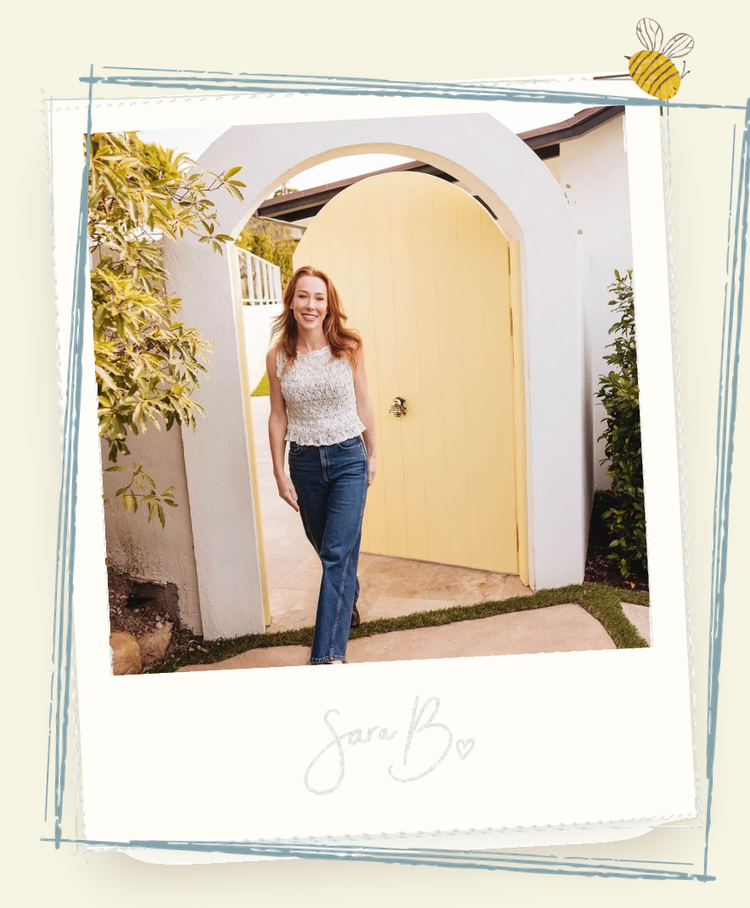 Sara Brennan, founder of Miss B’s Children’s Club, at the yellow door in Summerland