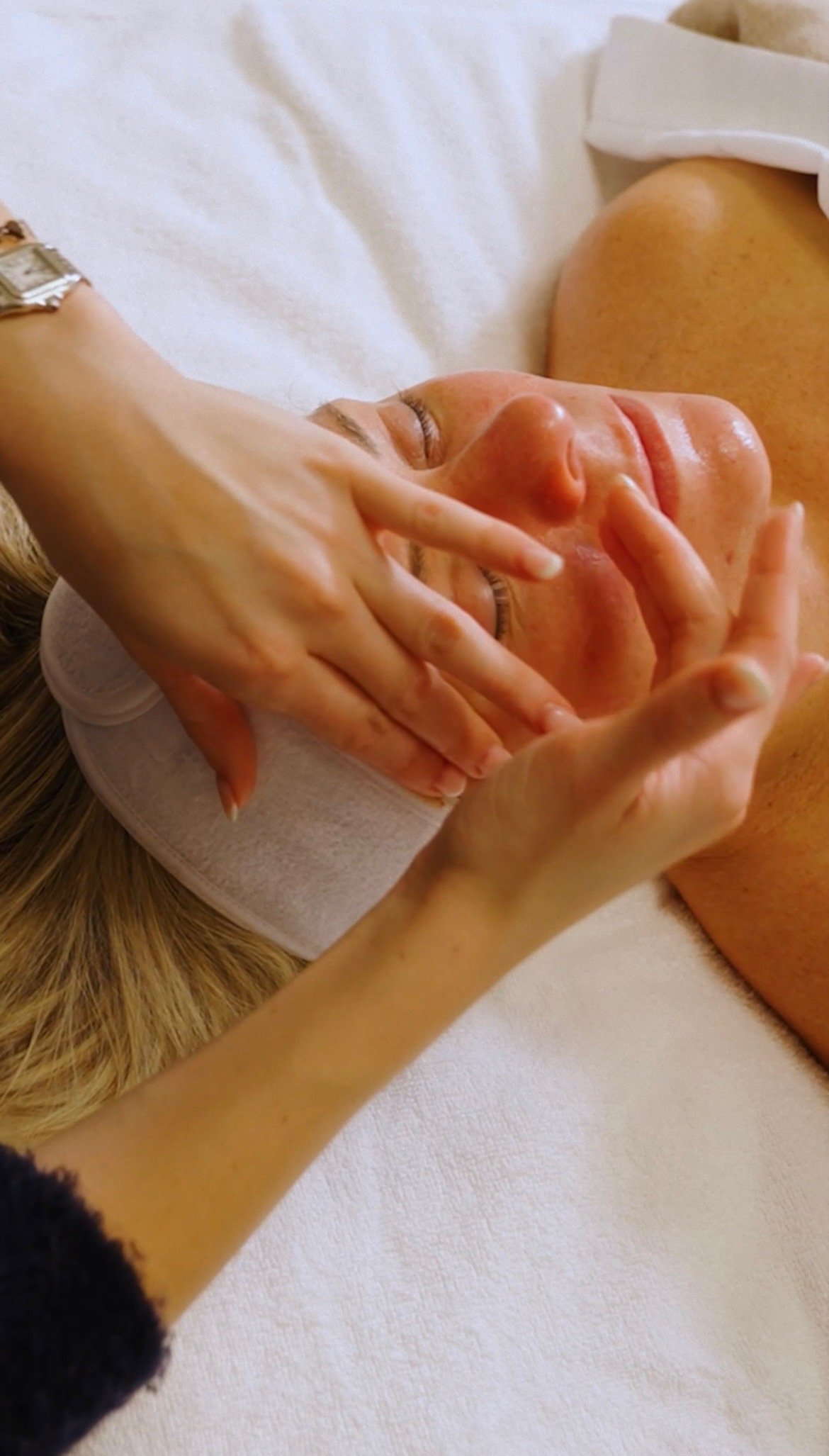 Manual lymphatic drainage facial massage.