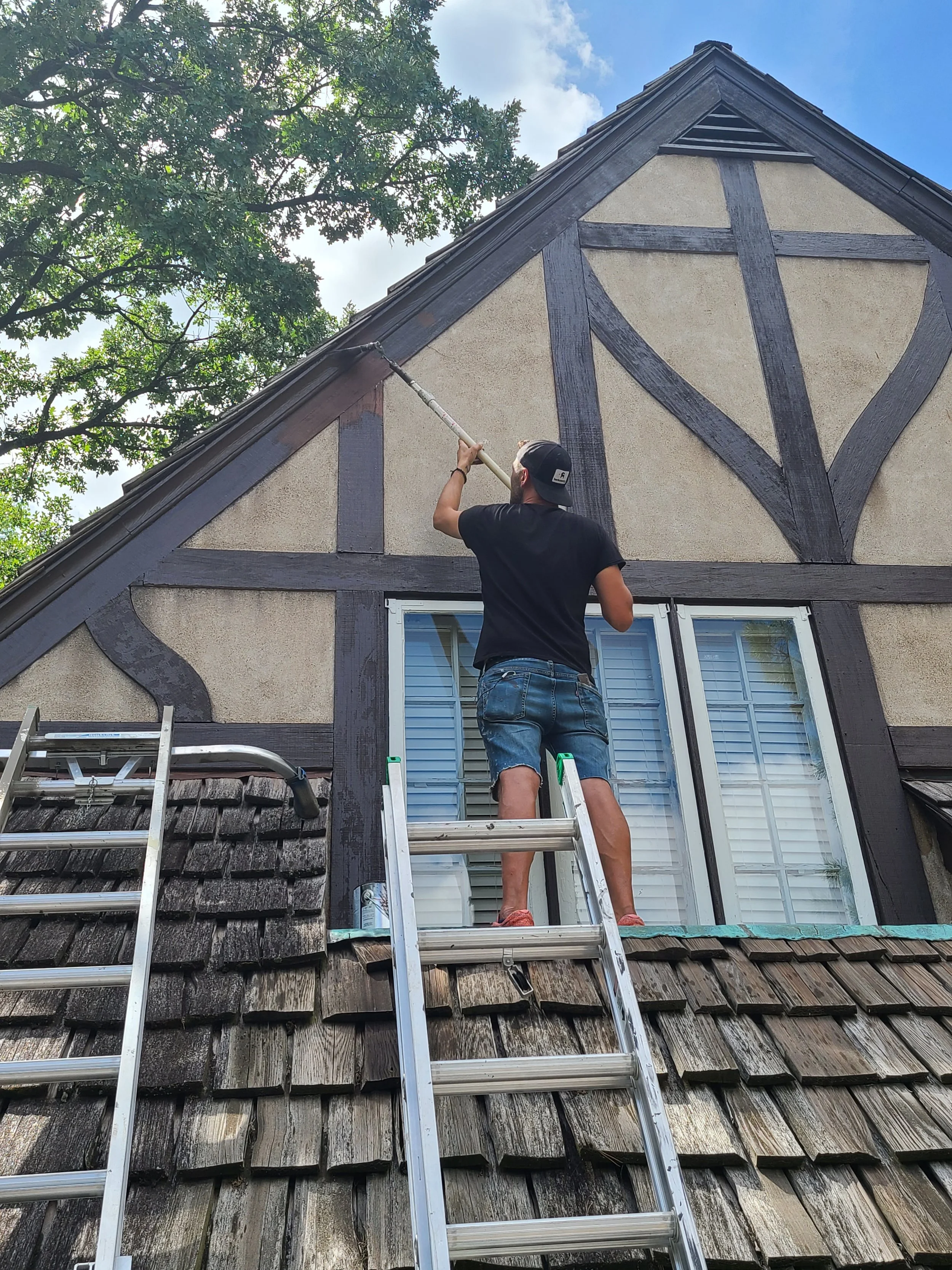Careful trim repaint on a classic Tudor home in Edina