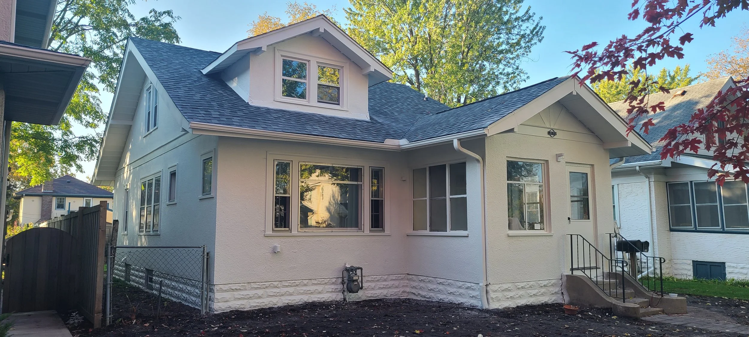 White and clean exterior repaint on a classic Mac-Groveland home in St. Paul