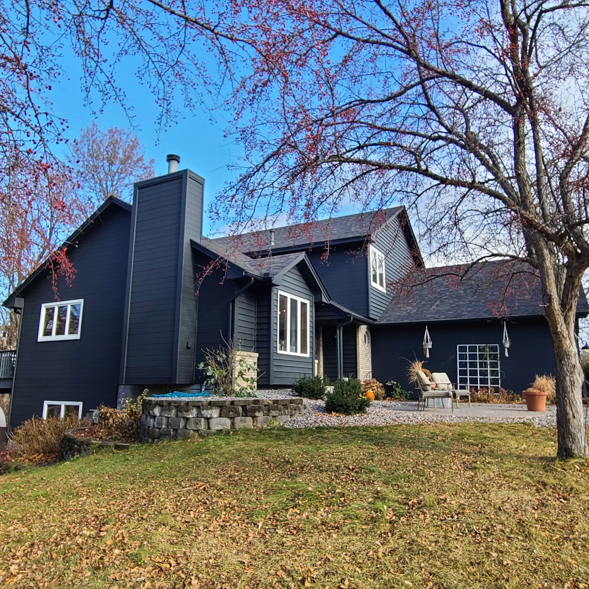 Modern dark exterior home painted by Best House Painters in the Twin Cities